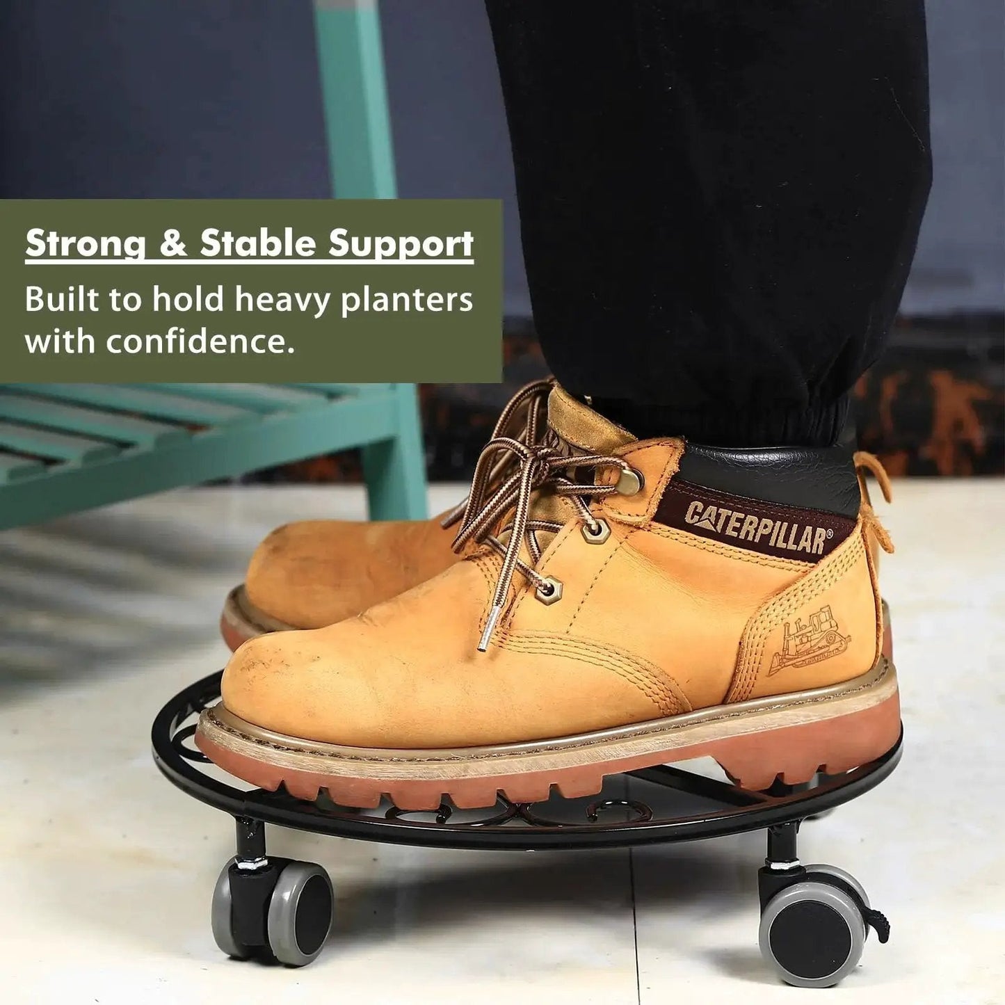 Person standing on Three Pack Heavy Duty Plant Caddies With Wheels 11.8 Inch Metal Plant Dollies Rolling Stands, illustrating strength
