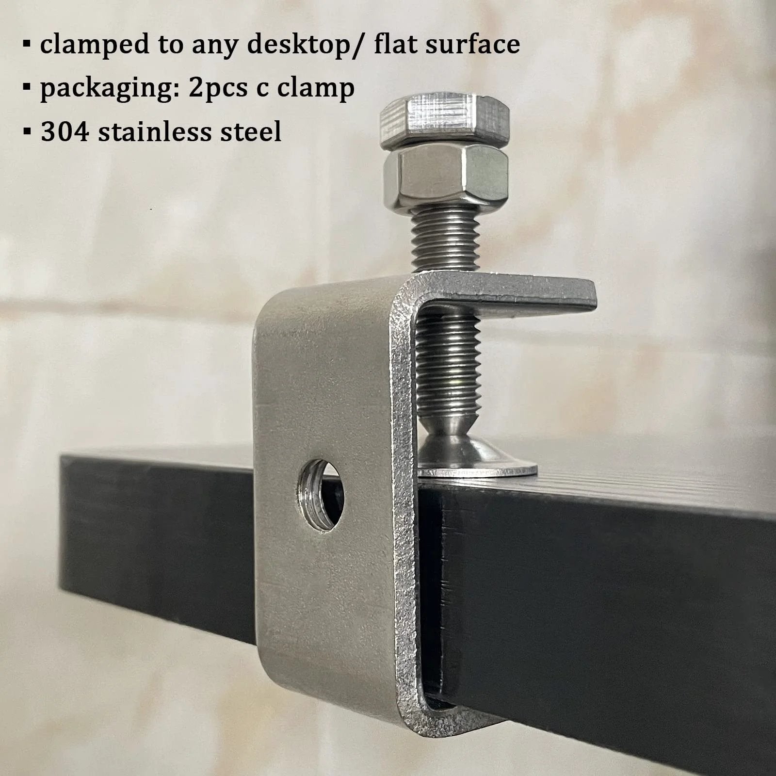 Installed Heavy Duty 2 Pack Stainless Steel C Clamp G Clamp With Wide Jaw Openings for secure fastening on a flat surface
