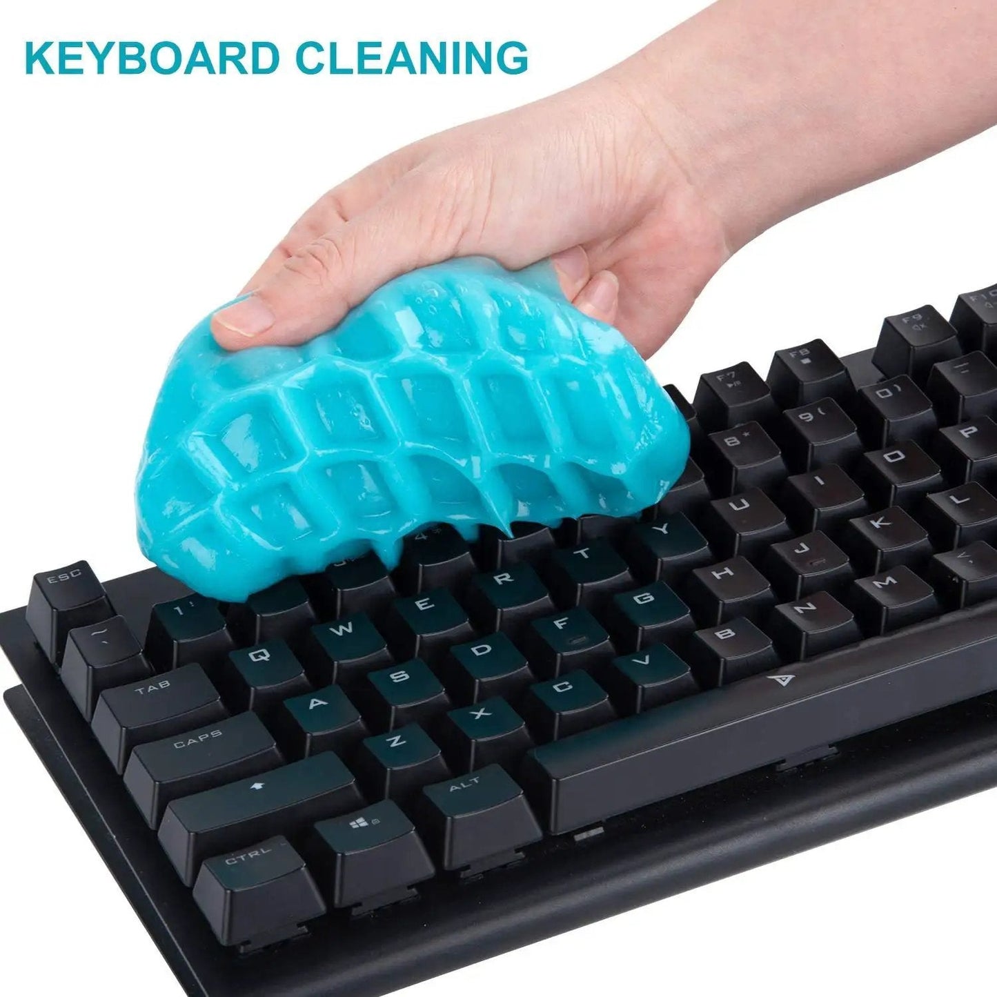 Cleaning Gel For Car Detailing Putty For Vents And Interior Dust Removal Gentle Auto Interior Cleaner Dust Slime For Cars Keyboard Gel Cleaning Putty 1 Pack being used to clean a keyboard.