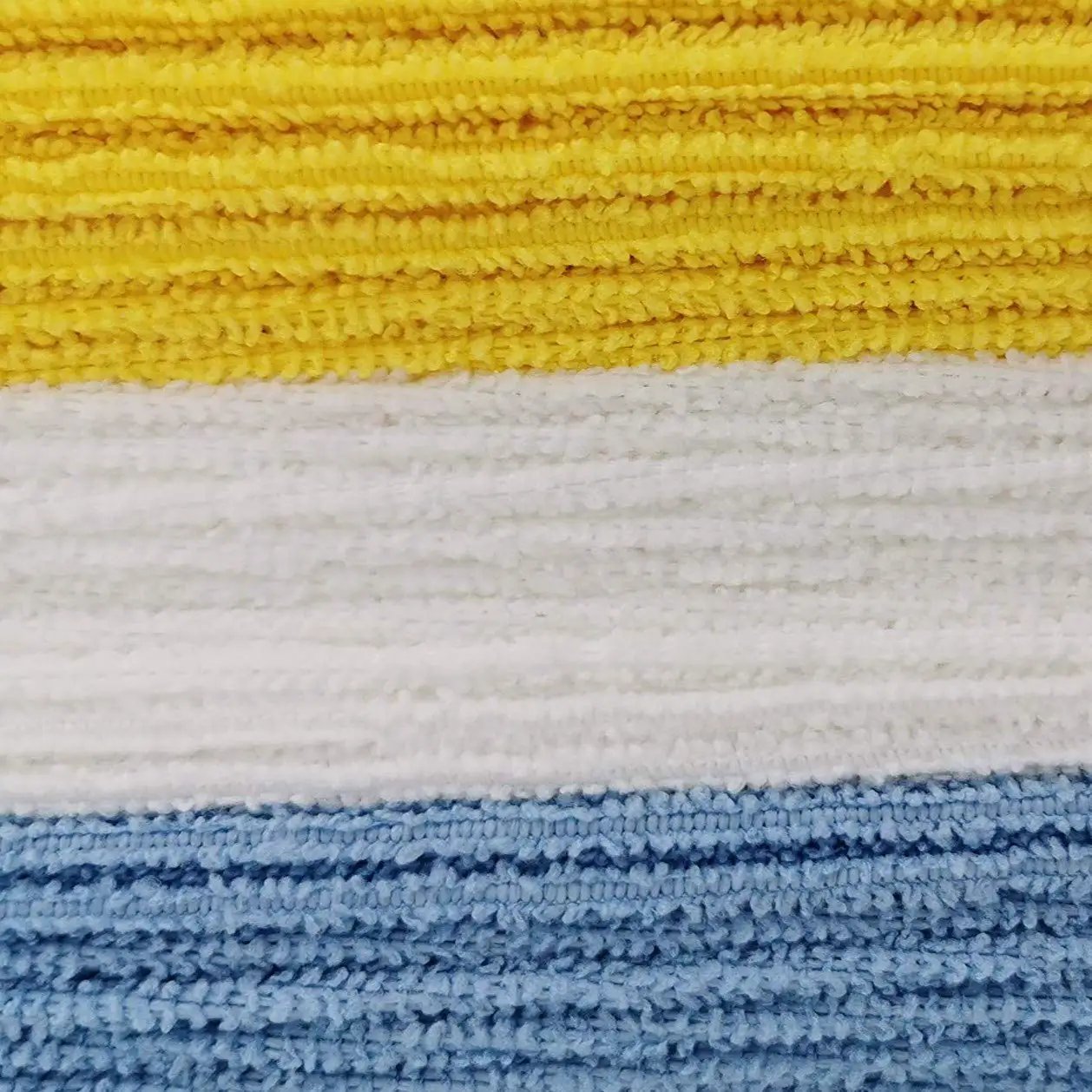 Close-up of colorful blue, white, and yellow Ultra Absorbent Microfiber Cleaning Cloths For Cars And Home Go To, 24 Pack, 16 By 12 Inches.