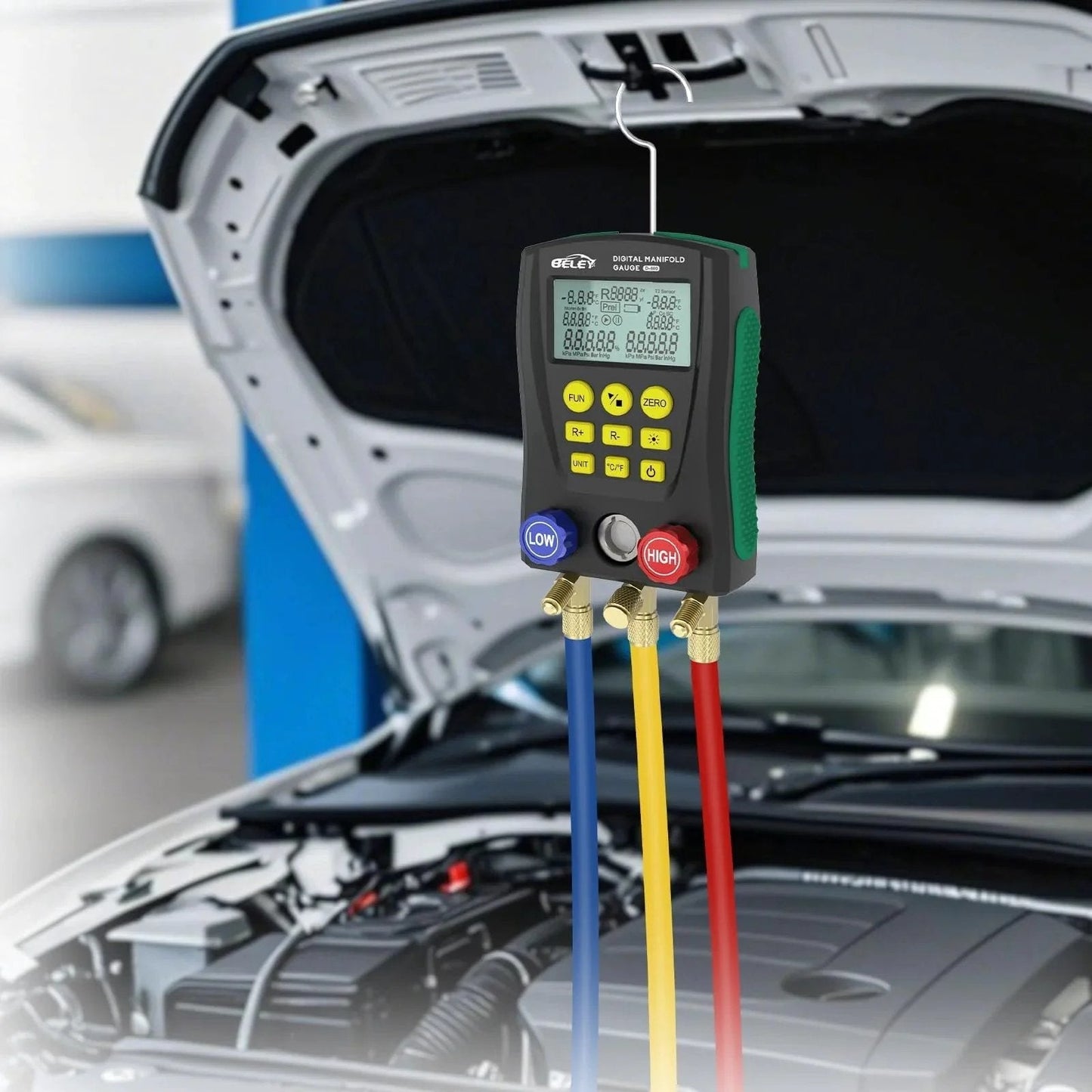 Digital Pro Grade HVAC Manifold Gauge Kit For Refrigerants With Dual Pressure And Temperature Tests hanging on car hood