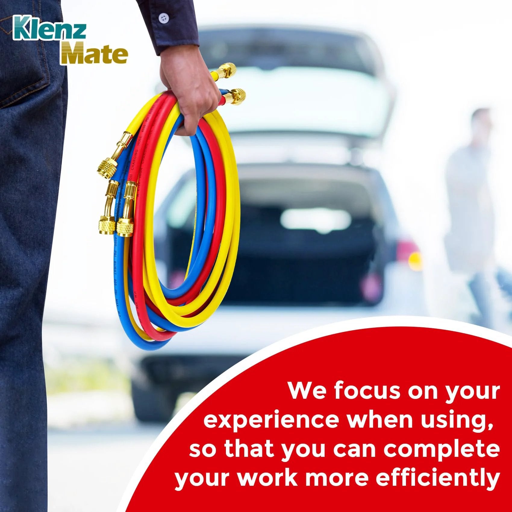Person holding Heavy Duty Refrigerant Charging Hose Set With Color Coded Hoses In Yellow Red And Blue, 96 Inch Long
