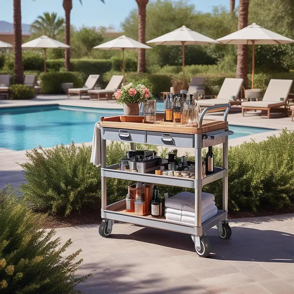 Outdoor bar cart with drinks and towels by a pool, showcasing 1.5 Inch Caster Wheels Set Of 4 Heavy Duty No Noise Swivel Top Plate Casters.
