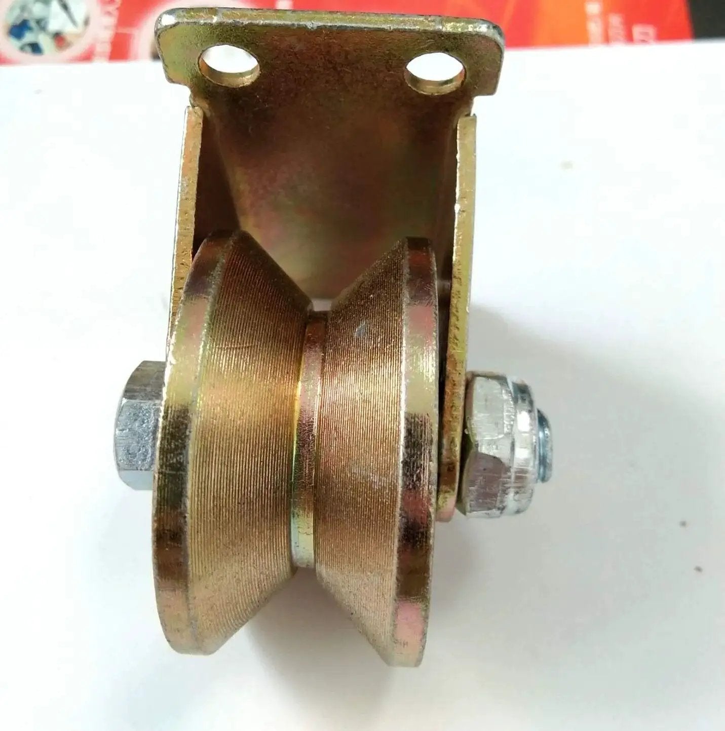 Side view of Heavy Duty V Groove Rigid Caster Wheel 49mm Diameter 2 Inch Plate Caster with 300kg Capacity, yellow 45 steel finish.