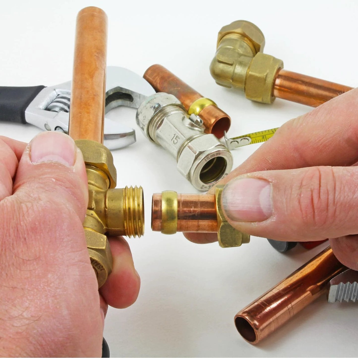 Hands installing Brass Compression Ferrule Kit For One Quarter Inch OD Hose Tubing, 20 Pack, Brass Ferrule Sleeves For Air Water Gas Plumbing