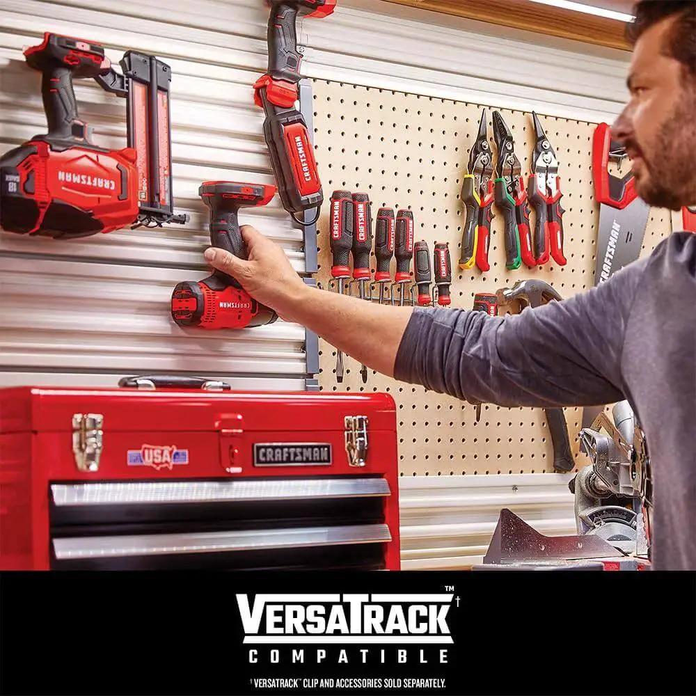Man organizing tools including Heavy Duty Impact Driver Bit Set With Black Oxide Coated Steel Bits And Precision Machined Tips.