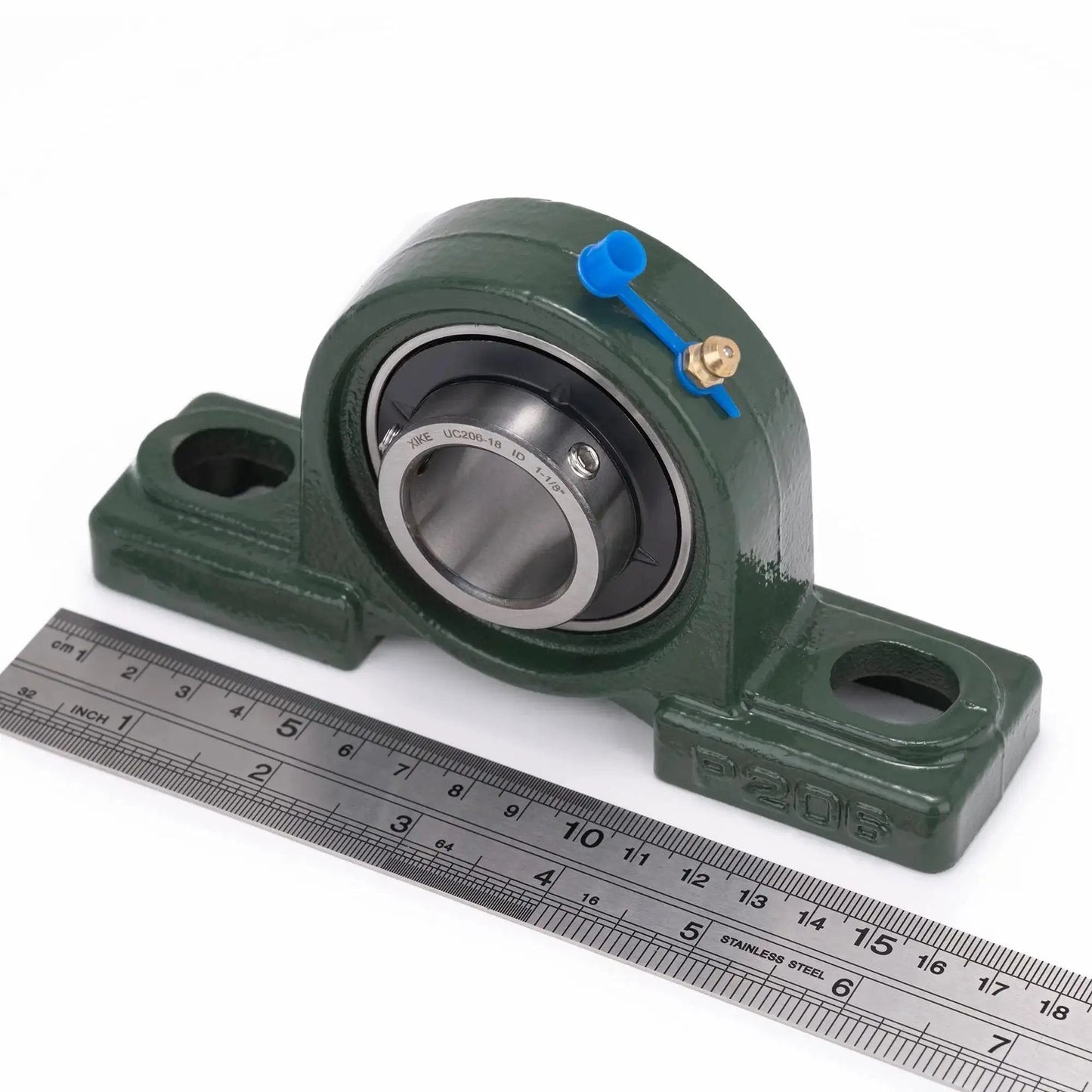 Front view of Two Pack Pillow Block Bearing Set UCP206-18 Bore 1 1/8 Inch Self Aligning Chrome Sealed Bearings with Cast Iron Base next to ruler.