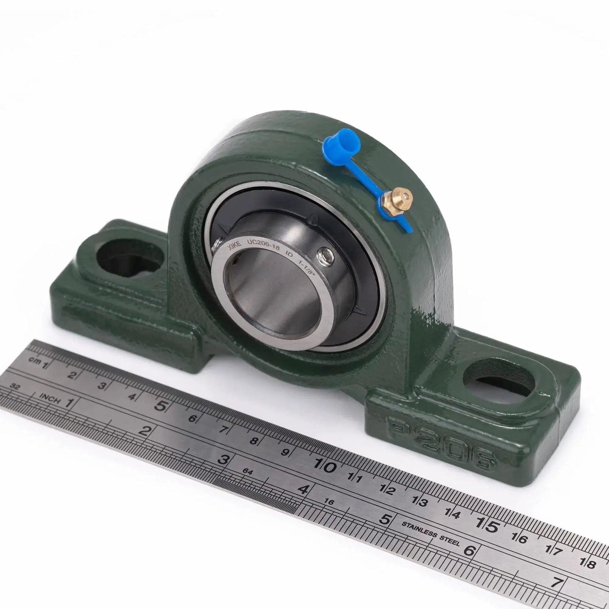 Front view of Two Pack Pillow Block Bearing Set UCP206-18 Bore 1 1/8 Inch Self Aligning Chrome Sealed Bearings with Cast Iron Base next to ruler.