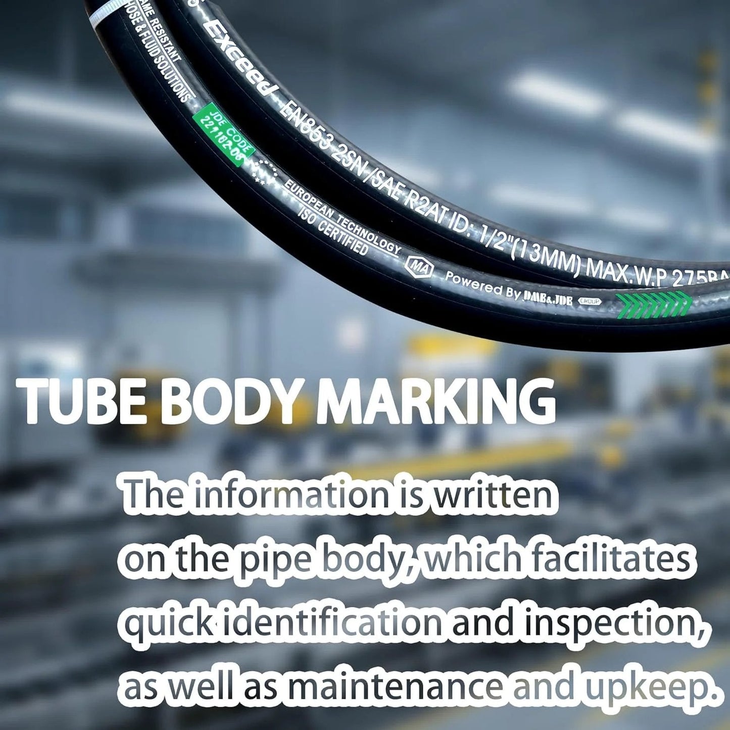 Close-up of tube body marking on industrial hose in a workshop setting, highlighting identification and inspection details.