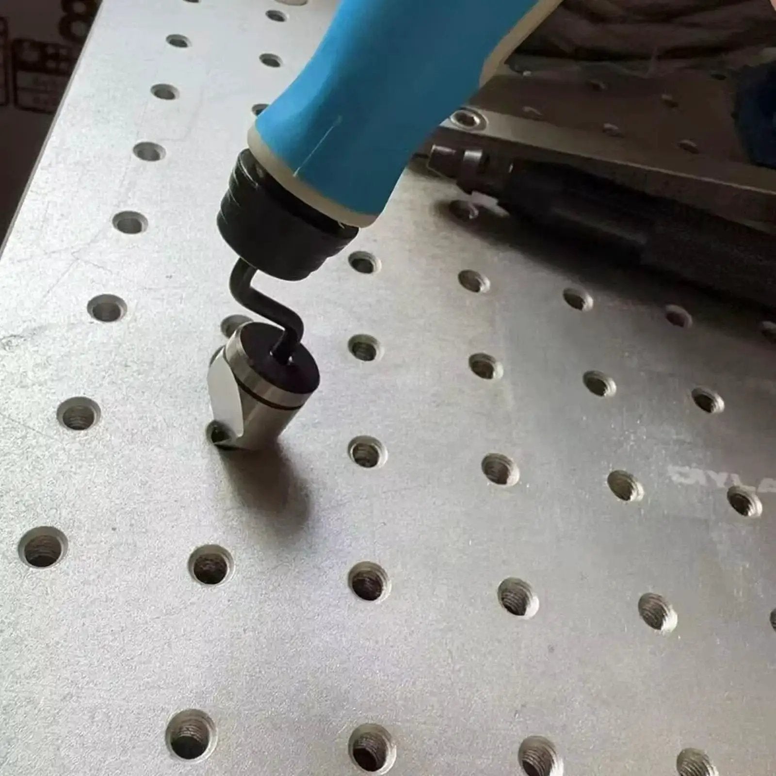 Pro Deburring Tool Set With 90 Degree Countersink Bit for Metal Wood and Plastic Chamfer Burr Remover in use on metal