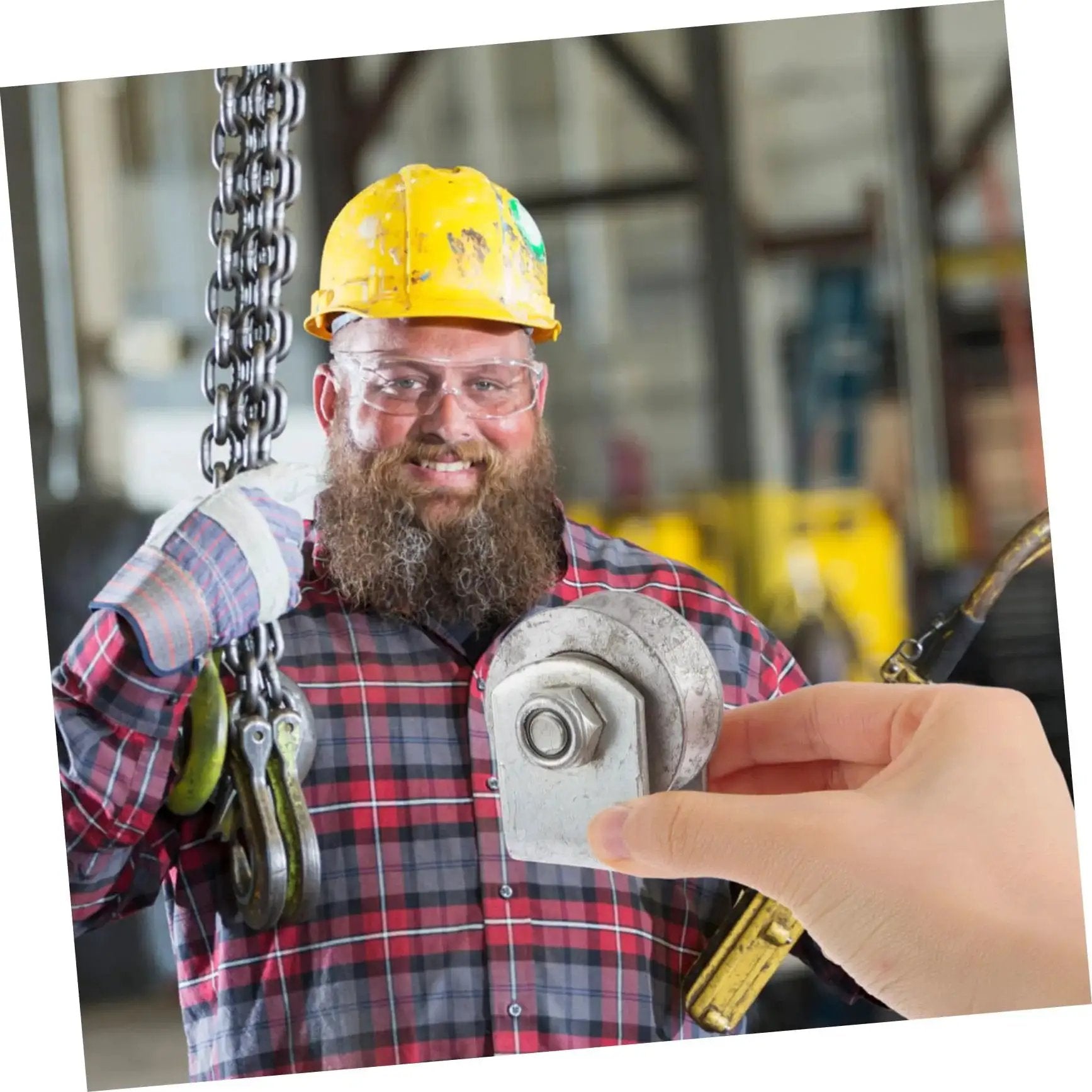 Worker holding Rugged Cast Iron V Type Groove Wheel Garage Door Roller for Gates and Sliding Doors in warehouse