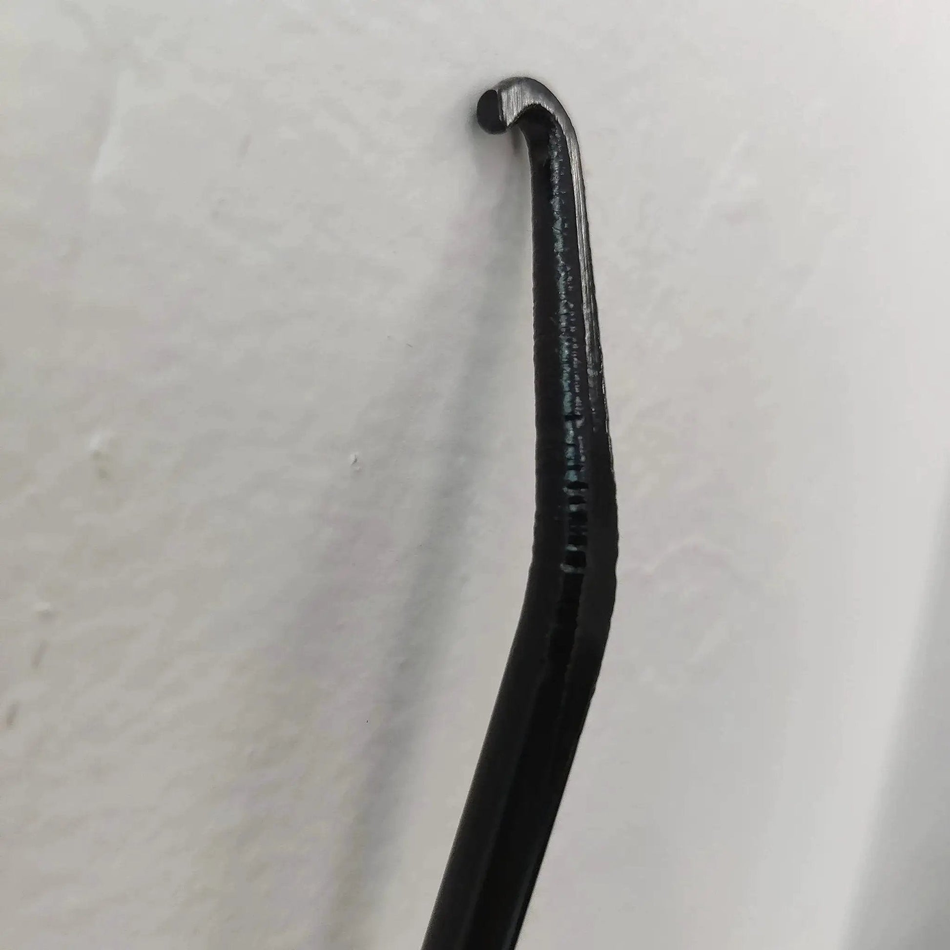 Close-up of a metal Exhaust Spring Hook T Shaped Handle For Motorcycle Rubber Coated Set Of 2, showing the hook's tip.