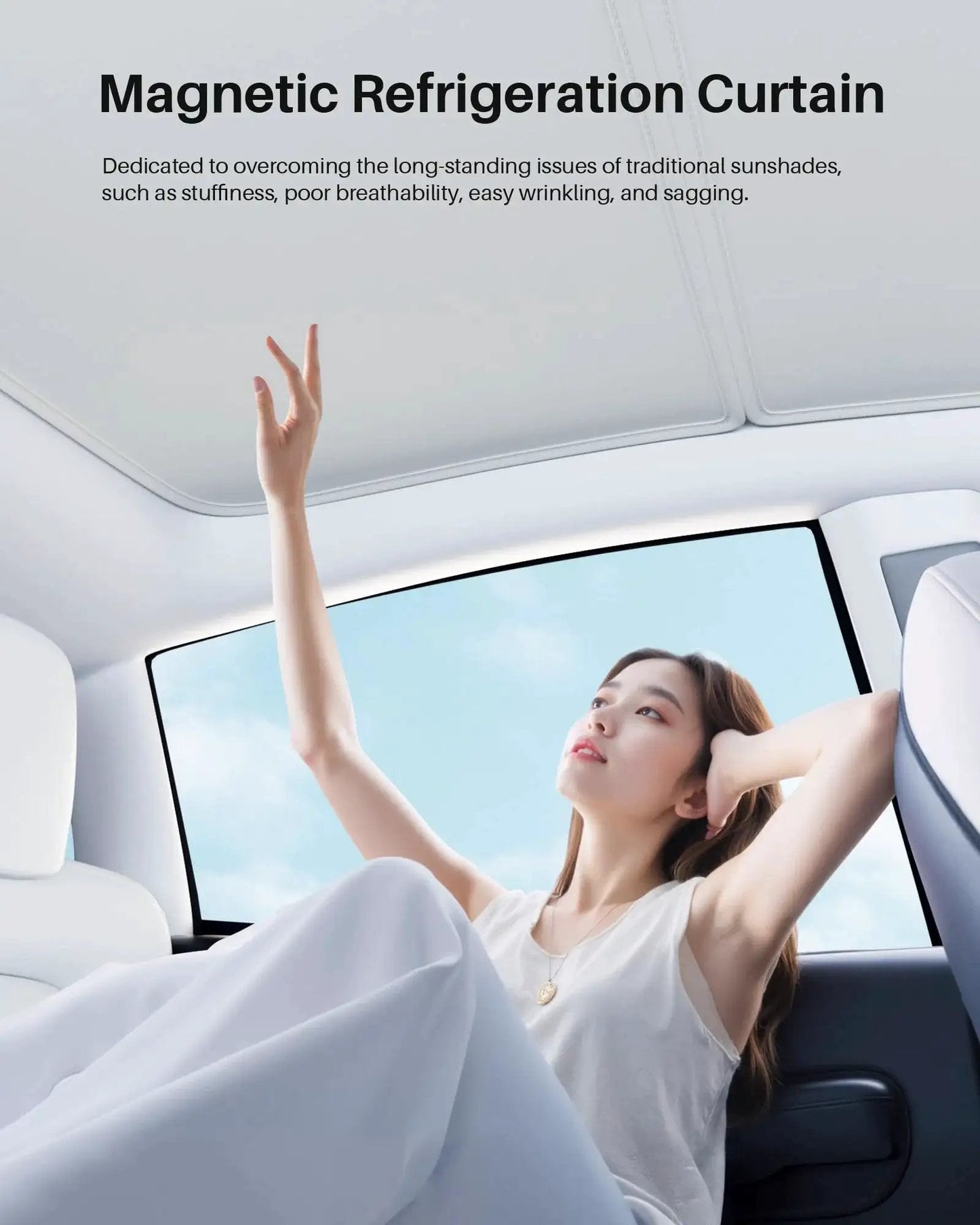 Interior view with woman under Model Y Upgraded Magnetic Sunshade Ice Silver Nano Coating 2 Piece Set Blue installed on car roof.