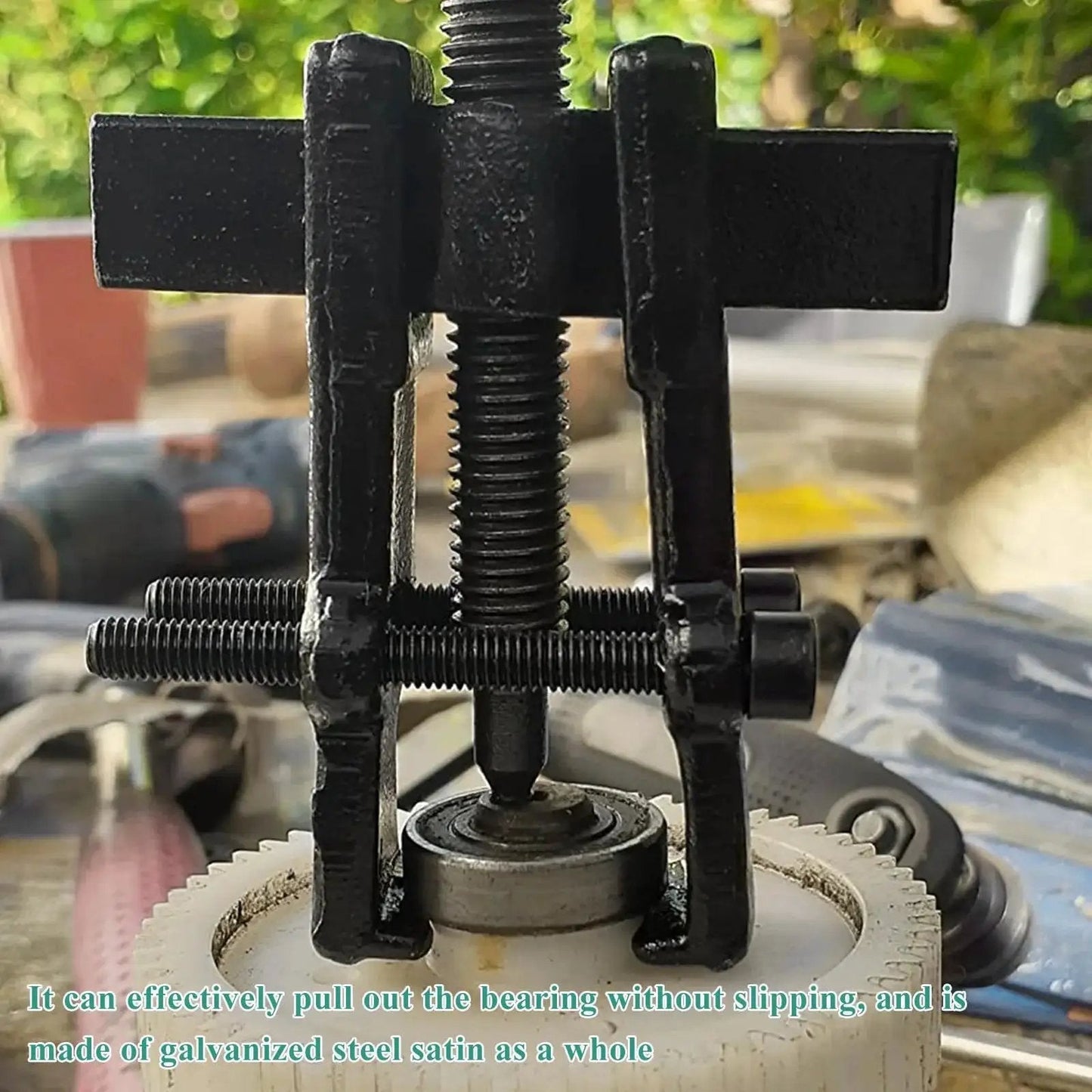 4 Inch Two Jaw Gear Puller with Adjustable Jaws for Auto Maintenance and Flywheel Removal demonstrating bearing extraction