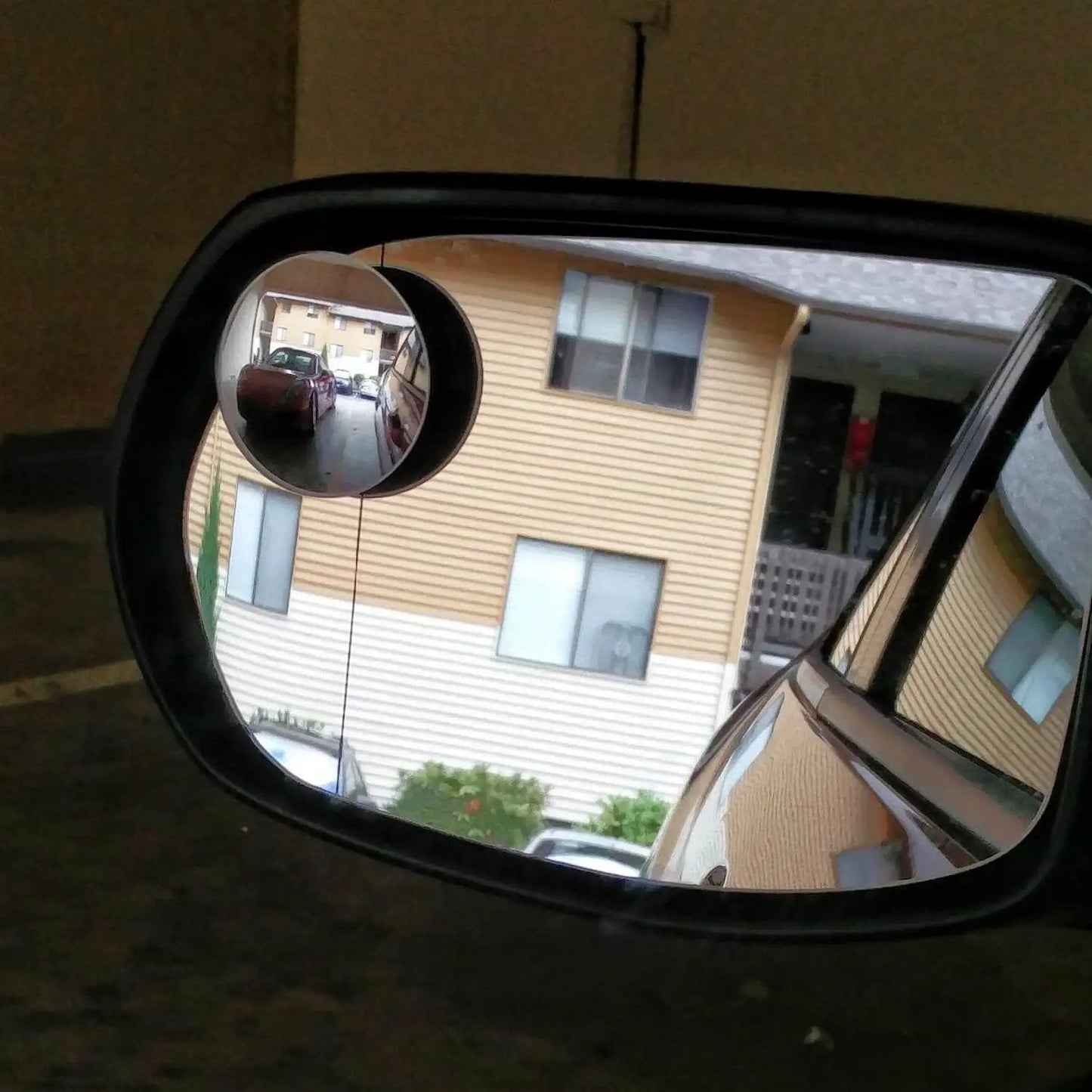 Blind Spot Mirror 2 Inch Round HD Glass Frameless Convex Rear View Mirror Pack Of 2 For Side Mirrors installed on a car side mirror.