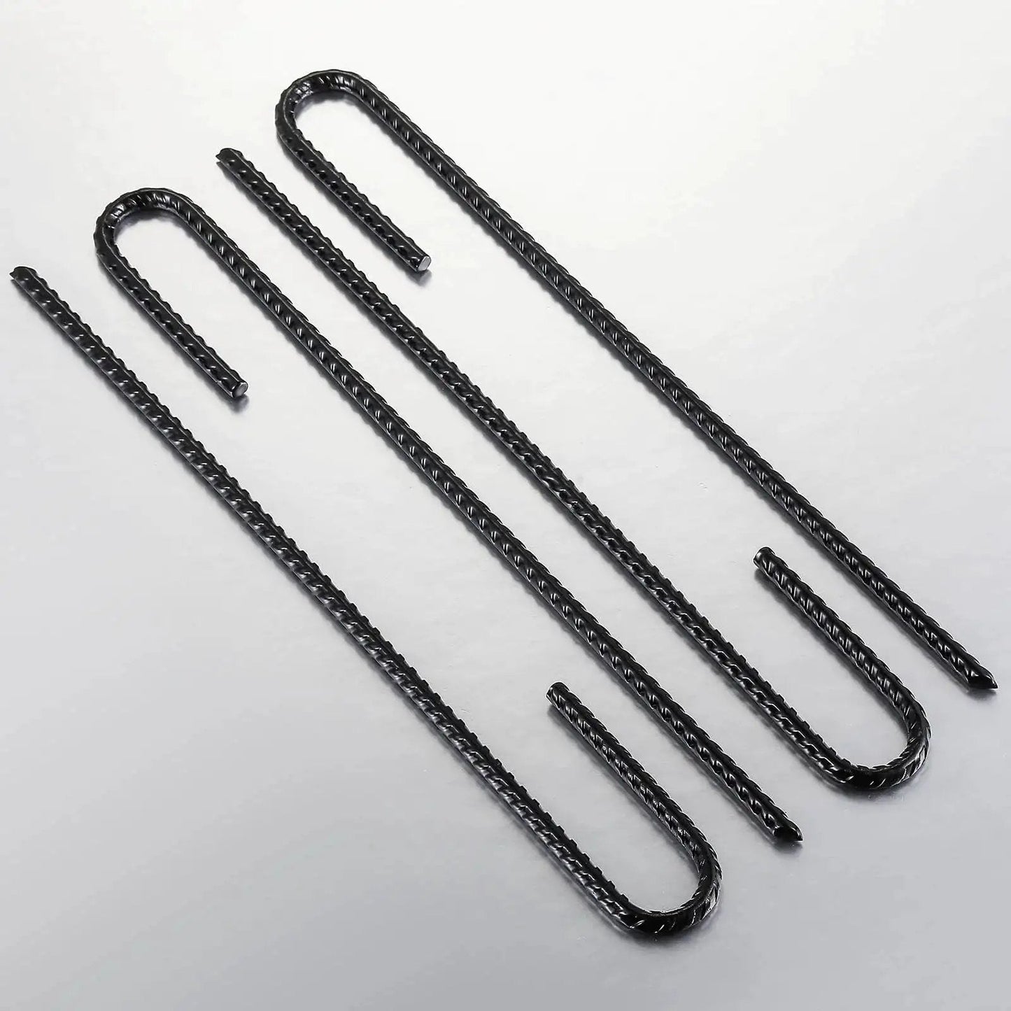Extra Heavy Duty UJ Hook Rebar Ground Anchors Twelve Inch Long By One Quarter Inch Diameter Rust Proof Coated Steel For Garden Tent And Trampoline Fifty Pieces J Hook For Outdoor Use To Secure Tents Canopies Play Equipment In Wind, arranged in a row, visible from above