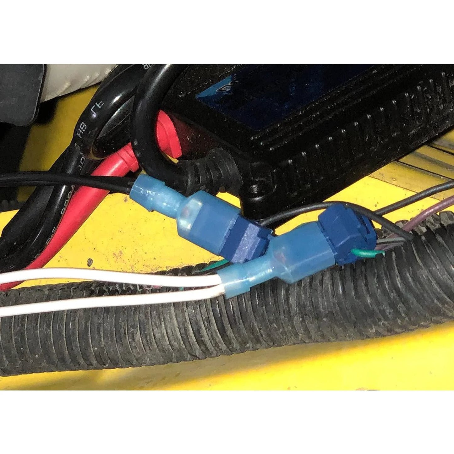 Easy Tap Self Stripping T Tap Wire Terminal Kit With 120 Pcs 60 Pairs Quick Splice Terminals And 60 Nylon Insulated Male Disconnects For Auto Marine Wiring Nilight 50004R With 2 Year Warranty in use, showing connected wires and terminals.