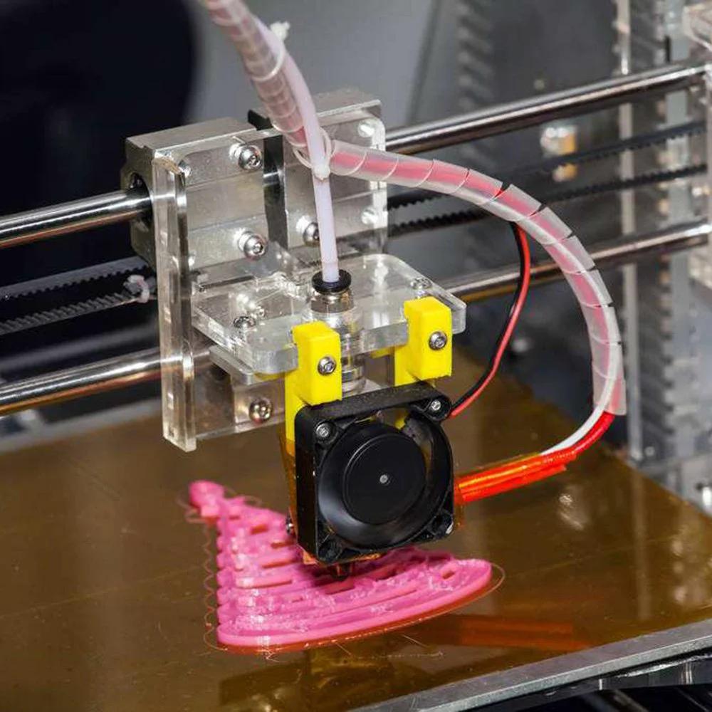 3D printer using PTFE Teflon Tubing Kit For 3D Printers 1.75mm Filament in operation, showing tubing and fittings.