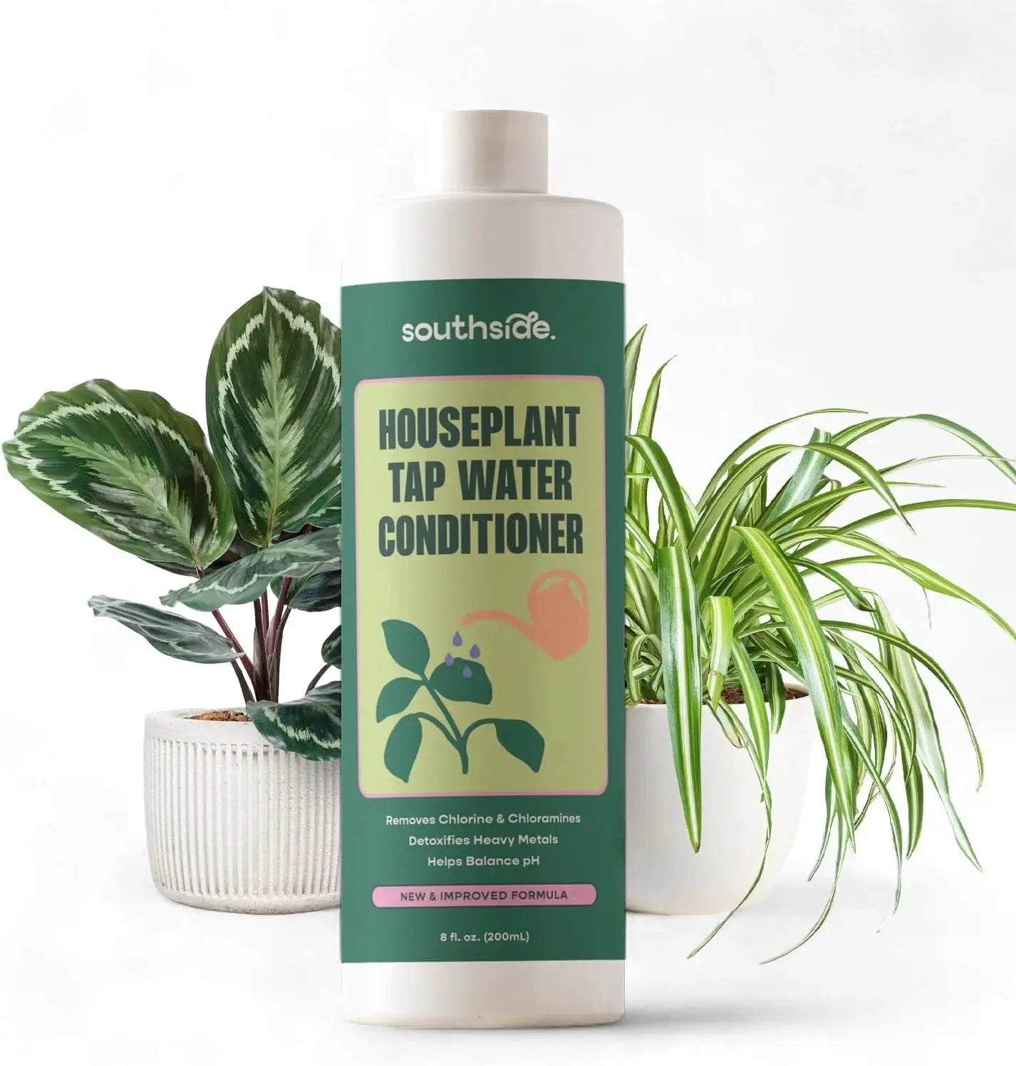 8 oz bottle of Tap Water Conditioner For Houseplants And Hydroponics That Removes Chlorine, Chloramines, And Heavy Metals, Buffers pH, with plants.