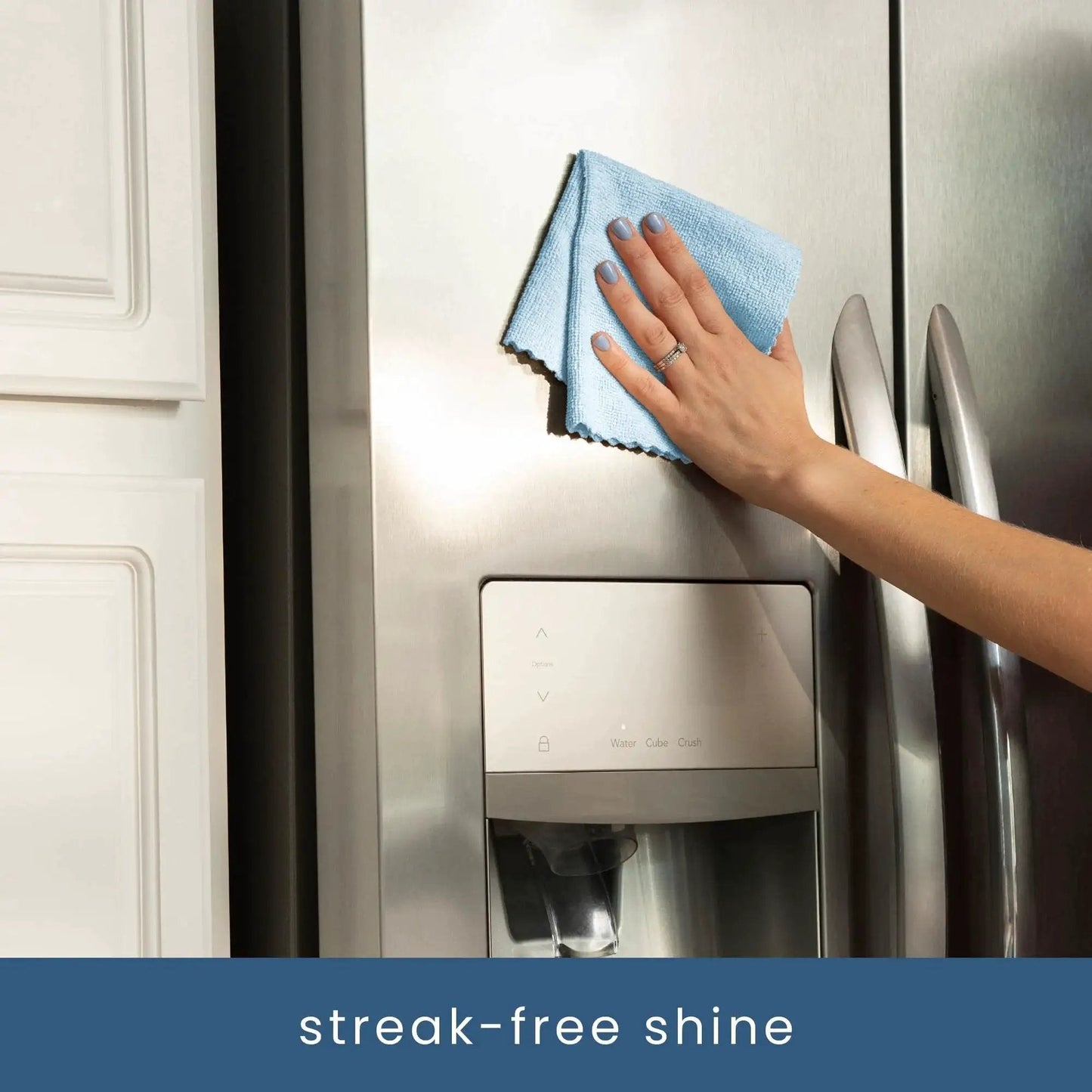 Person cleaning fridge with 50 Pack Microfiber Towels 11.8x11.8 In Lint-Free Reusable For Home And Car