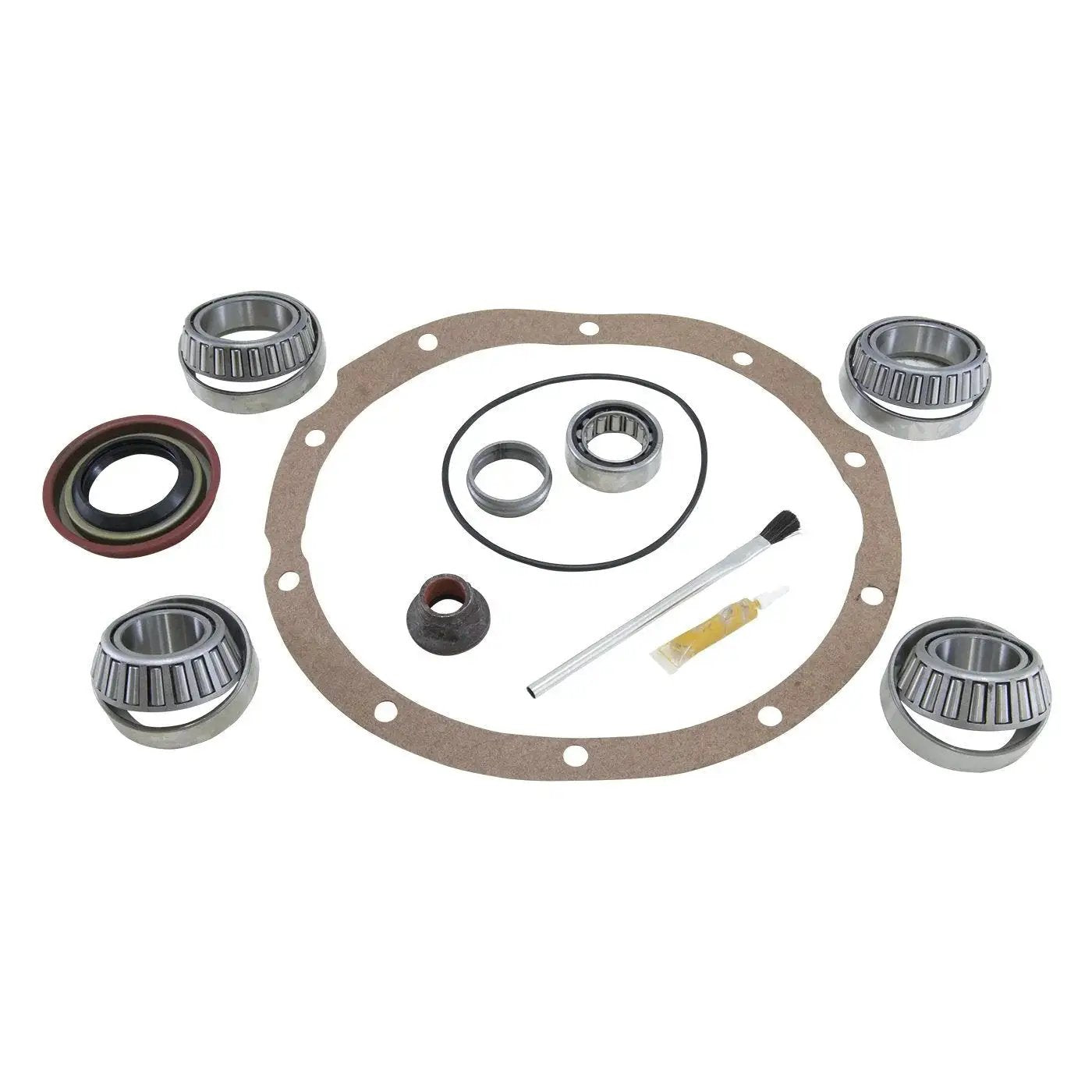 Components of Ford 8 Inch Differential Bearing Install Kit For Positraction Or Locker displayed, includes bearings, seal, and brush.