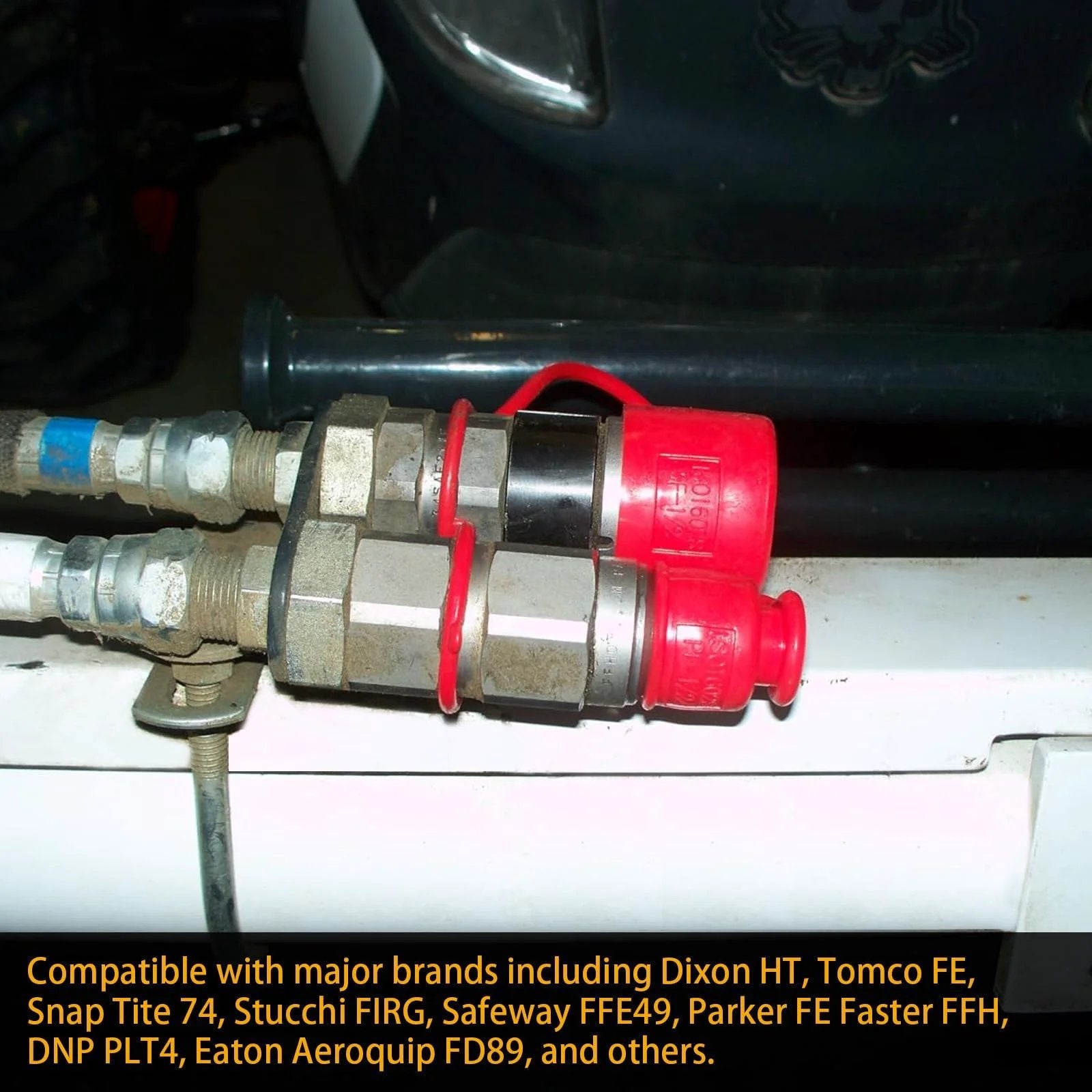 Dust Cap And Plug Kit For Half Inch Flat Face Hydraulic Quick Connect Couplers Includes Four Male And Four Female Rubber Covers Universal Fit For Skid Steer Bobcat Attachments, shown installed on hydraulic connections.