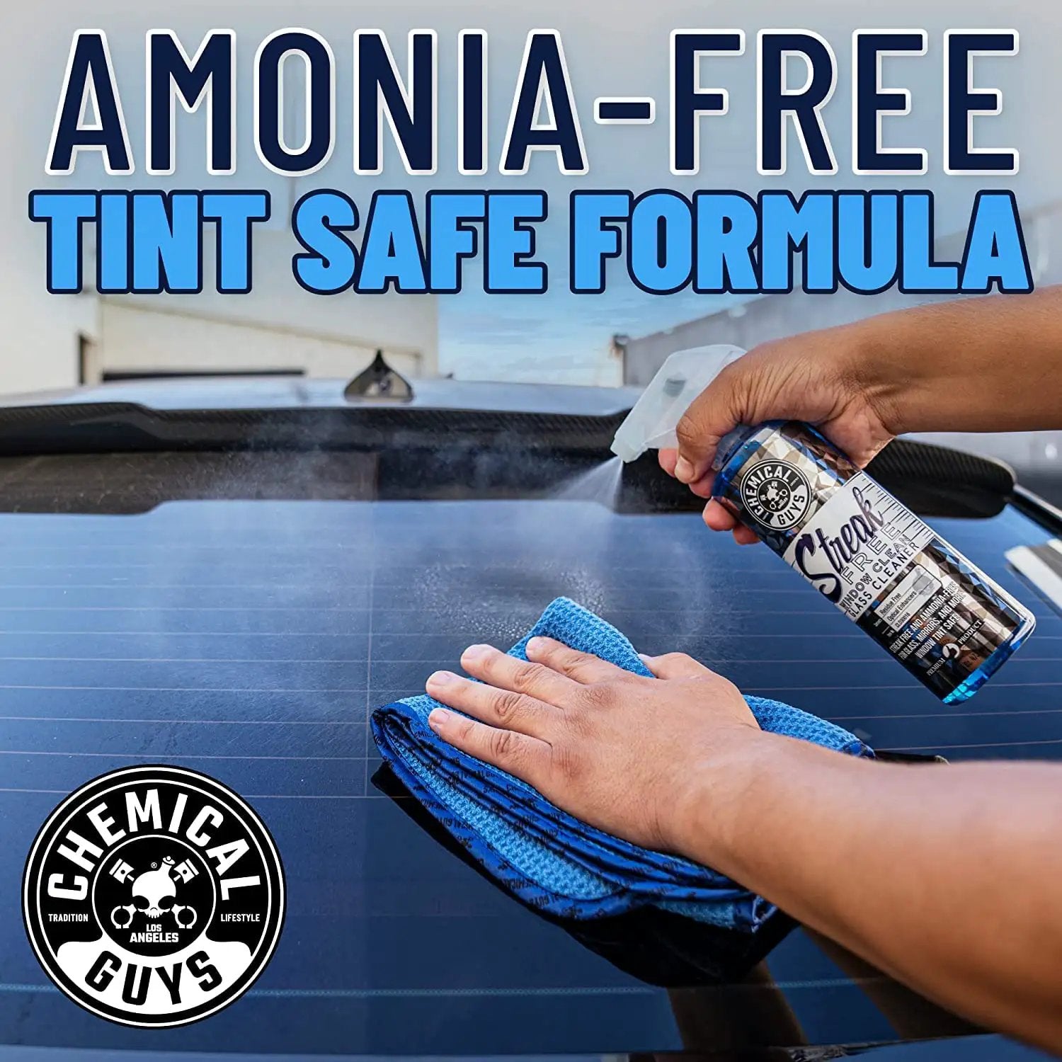 Person applying Streak Free Glass And Window Cleaner That Delivers Crystal Clear Windows For Car, Truck, SUV And Home, Mirrors And Navigation Screens, Ammonia Free And Safe On Tinted Glass 473 Ml From Chemical Guys on a tinted car window.