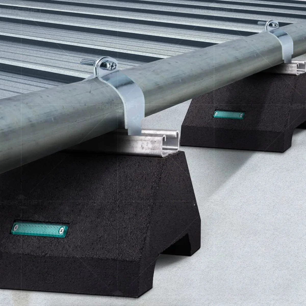 Rooftop Pipe Support Block With Galvanized Steel Strut For Conduit And HVAC Workhorse Sleeper Curb Replacement 750 Pound Capacity Five And Three Quarters Inch By Ten Inch Block Recycled Rubber Black installed on flat roof