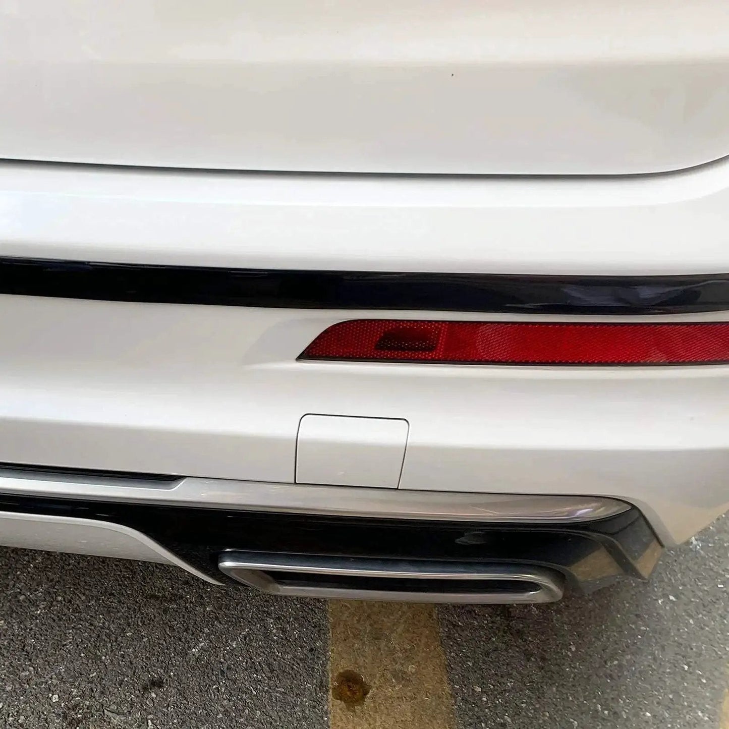 Glossy Black 12mm Automotive Trim Molding 25 Foot Self Adhesive for Vehicles installed on rear bumper of car