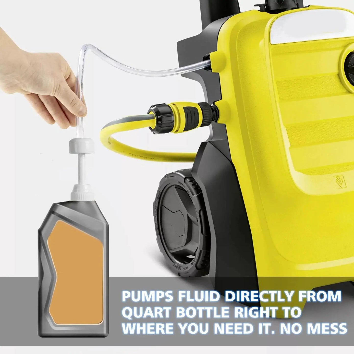 Hand using Quart Fluid Pump With 10cc Stroke And Third Hand Adapter For Transmission Fluids attached to yellow machine