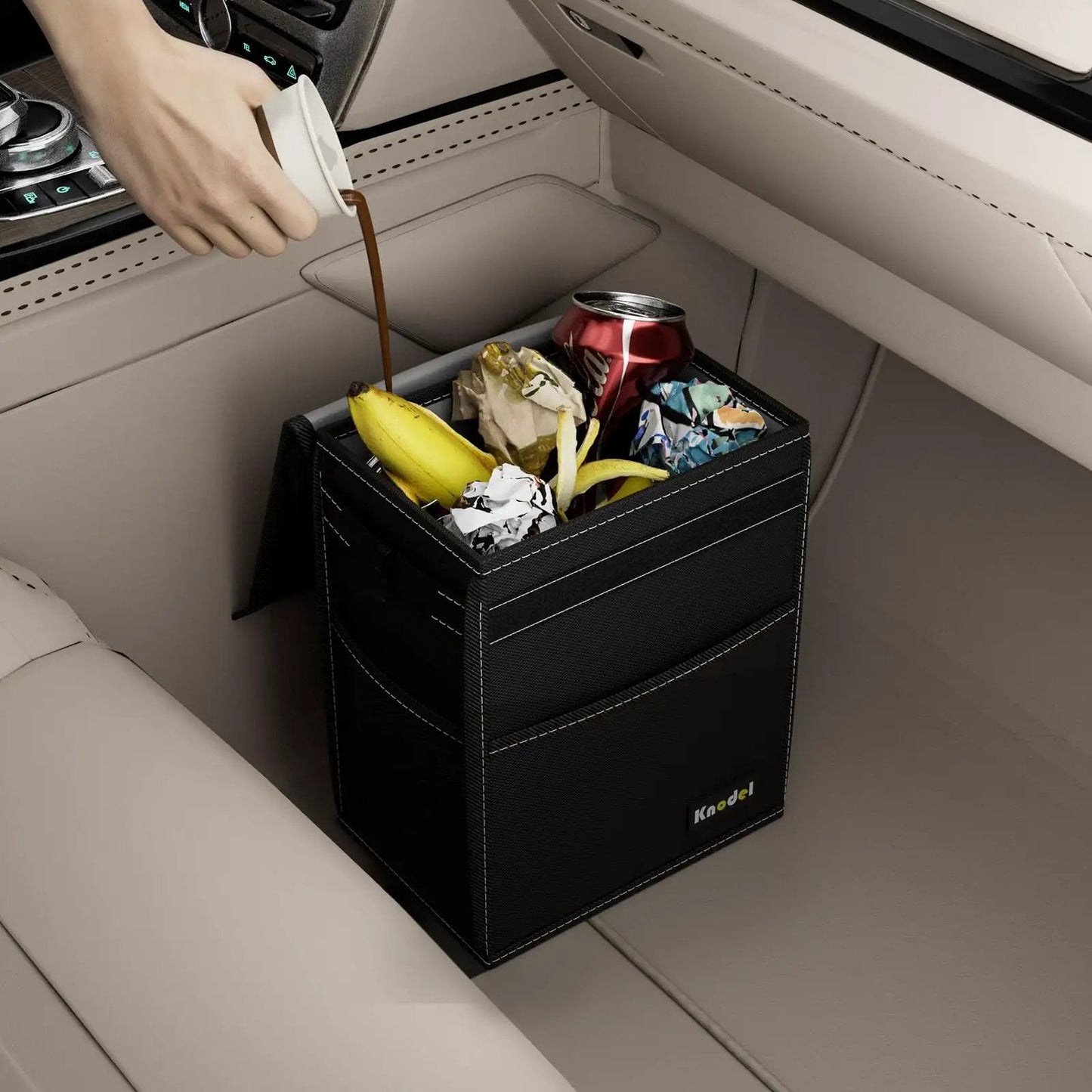 Leakproof 2 Gallon Car Trash Can With Lid Black Waterproof Organizer For Cars With Adjustable Straps That Mount Anywhere For A Clean Ride That Keeps Spills Contained Odors Locked Down in car with debris inside.