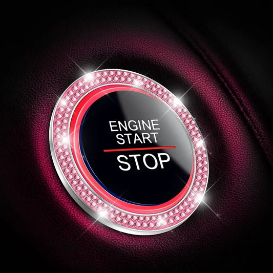 Close-up of Pink Car Start Button Bling Ring Set 2 Pack Crystal Rhinestone decals around engine start button in luxury car interior.