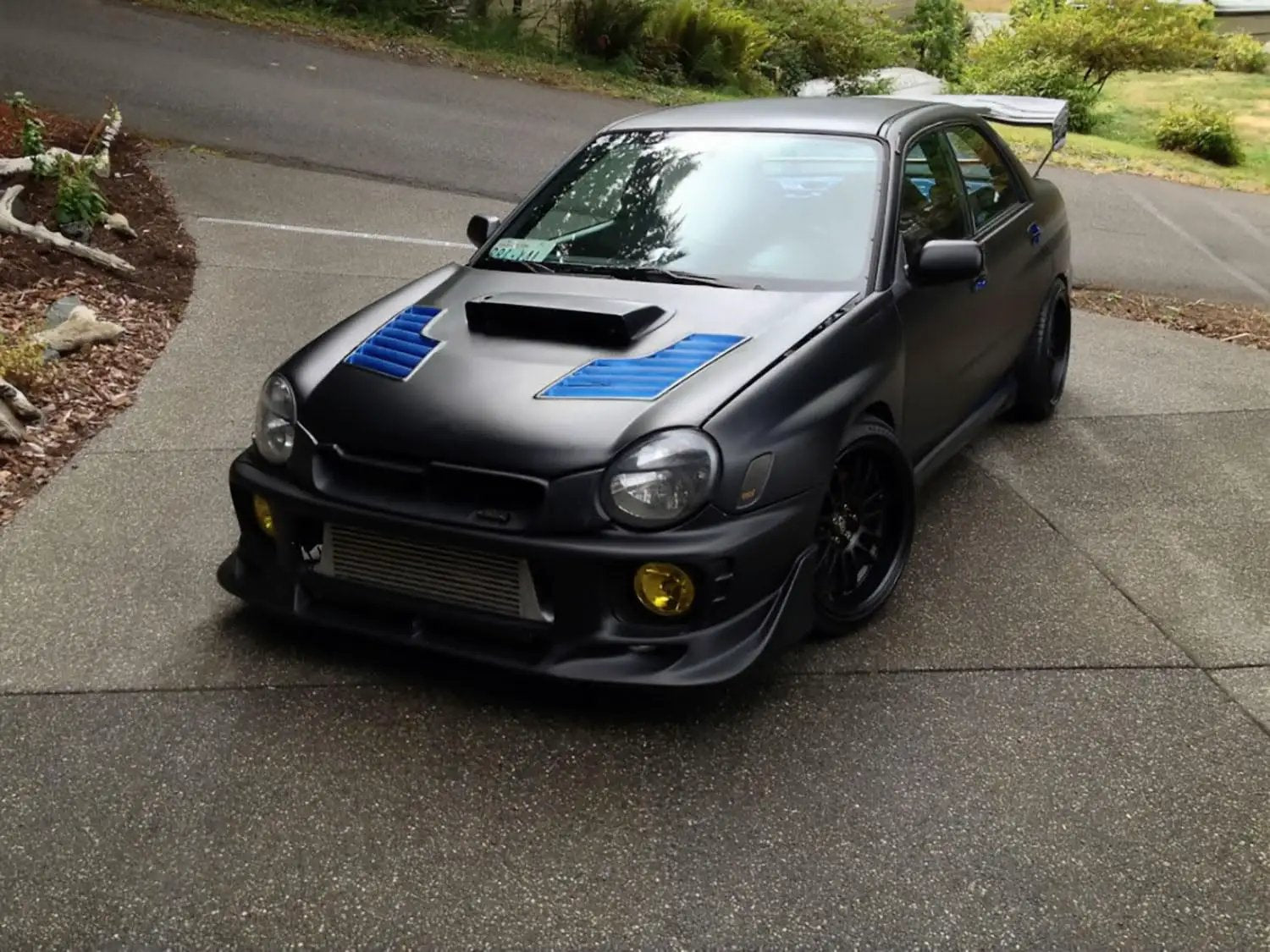 Matte Black Vinyl Wrap Roll With XPO Air Release Technology For DIYers 1Ft By 5Ft Durable Lightweight Film For Easy Wrapping And Paint Alternative From VViViD Vinyls on modified car.