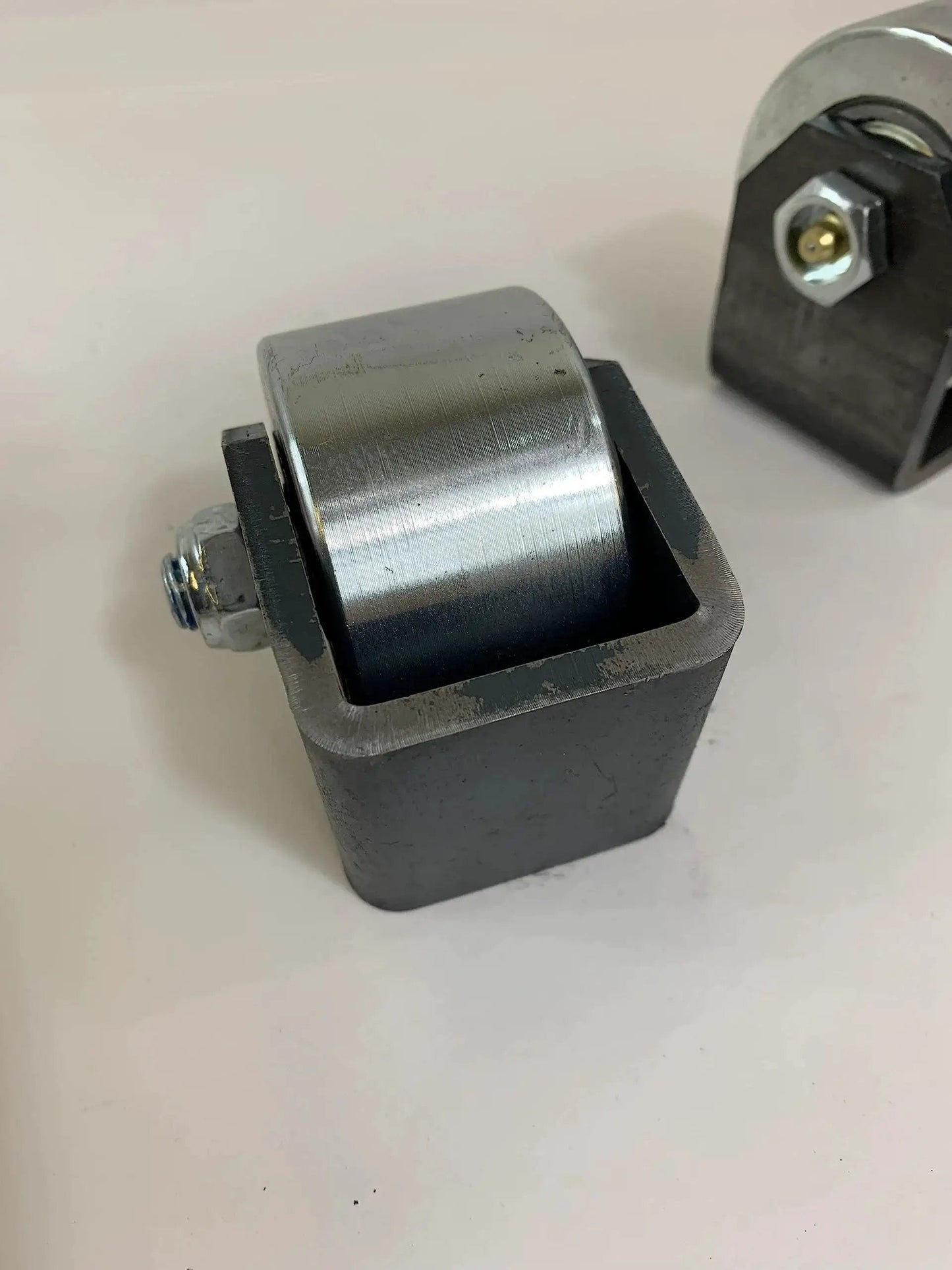 Set Of 2 Weld On Trailer Tail Drag Casters With Solid Steel Rollers And Greasable Axle 1.5 Inch Wide For Motorhomes RVs 5th Wheels And Campers