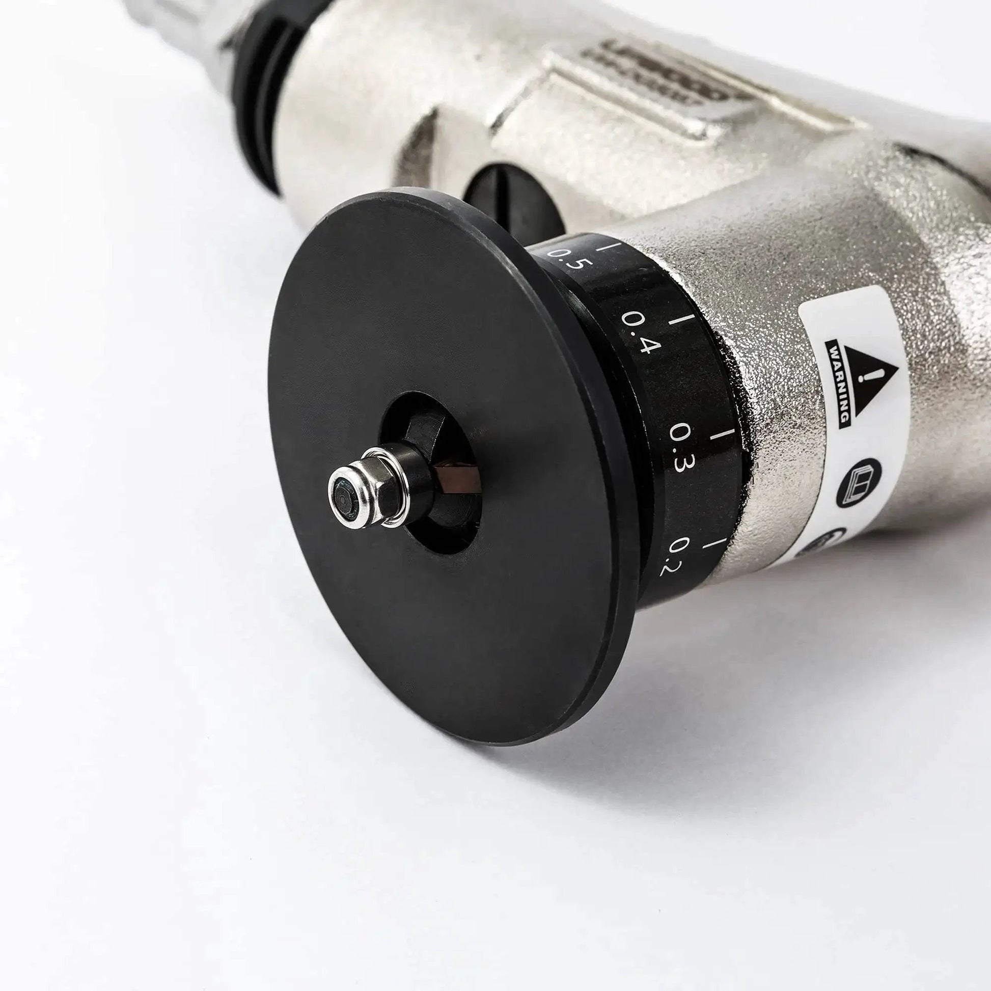 Close-up of Lightweight Pneumatic Chamfer Tool For Metal Deburring, Tiny Yet Mighty Mini Air Beveler With Dual Cutter Head, 360 Degree Exhaust