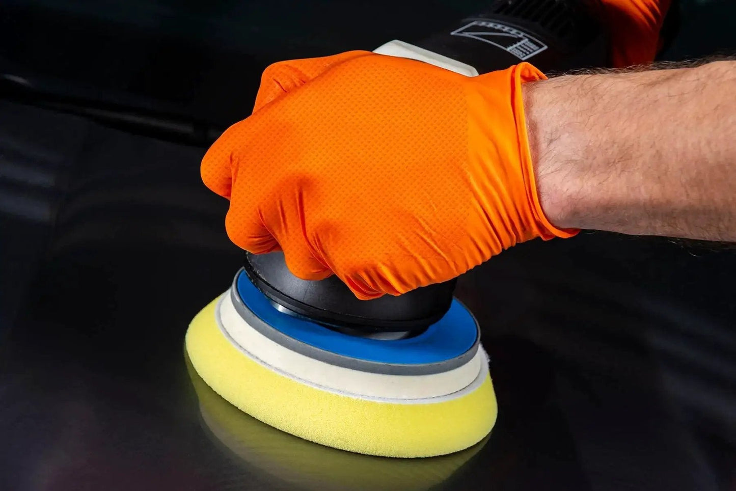 8 Mil Orange Nitrile Gloves With Diamond Textured Grip for Industrial and Food in use during automotive polishing