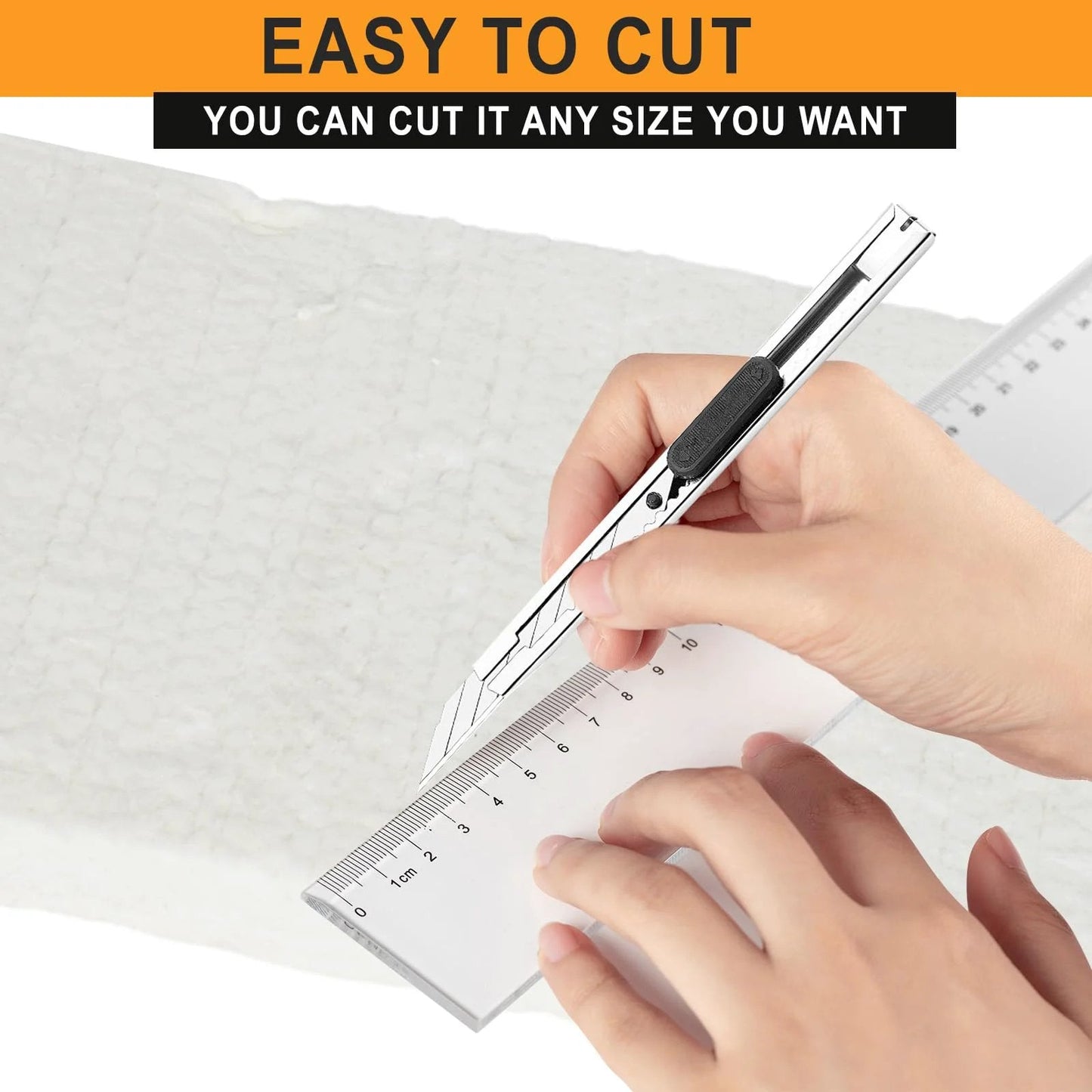 Person cutting Heavy Duty Ceramic Fiber Insulation Blanket 2 Inch Thick 15 By 24 For Furnaces Kilns Stoves And Fireplaces 2400F
