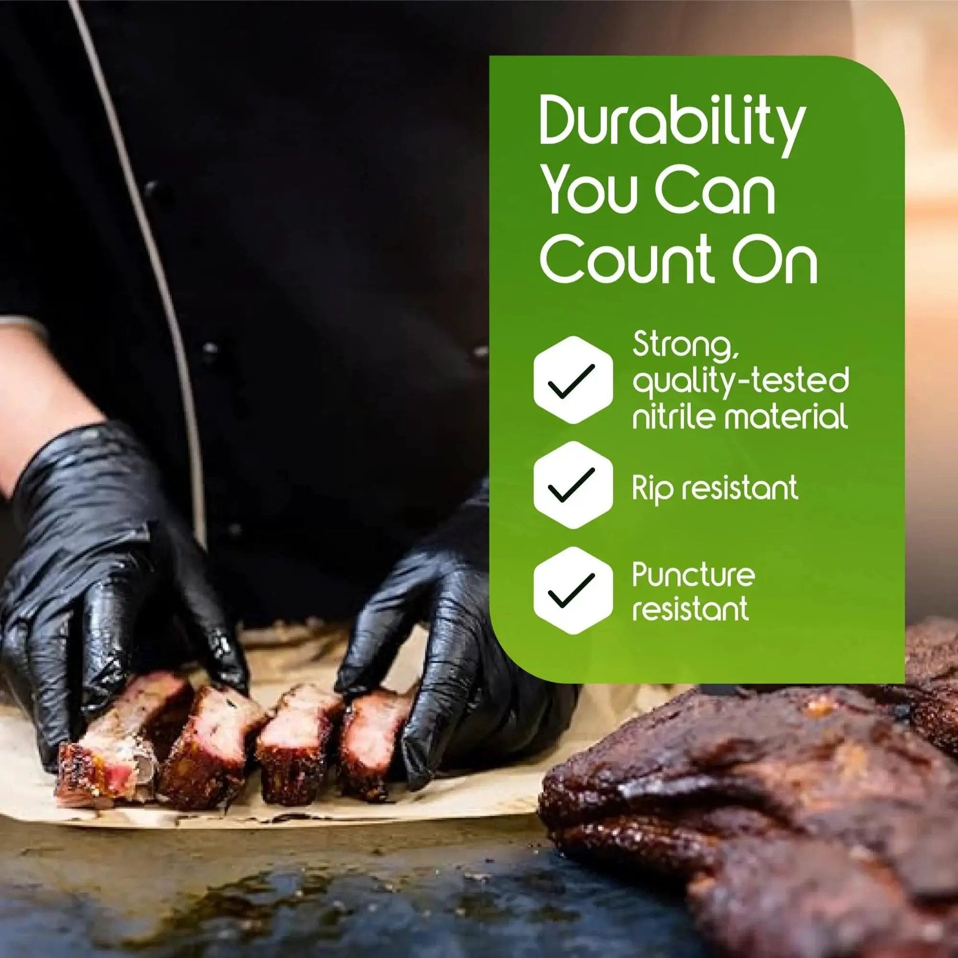 Person wearing Heavy Duty 6 Mil Black Nitrile Gloves Latex Free For Industrial Food Tattoo handling barbecue ribs