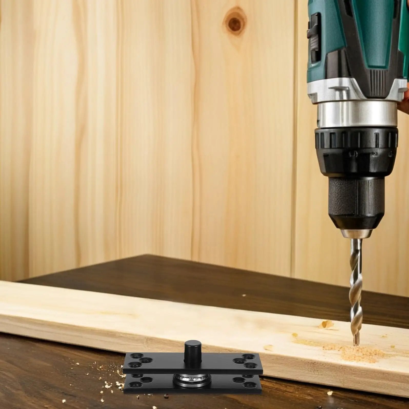 Slick Hidden Stainless Steel Rotating Door Hinge 360 Degree Concealed Heavy Duty Pivot shown with drill on wood surface