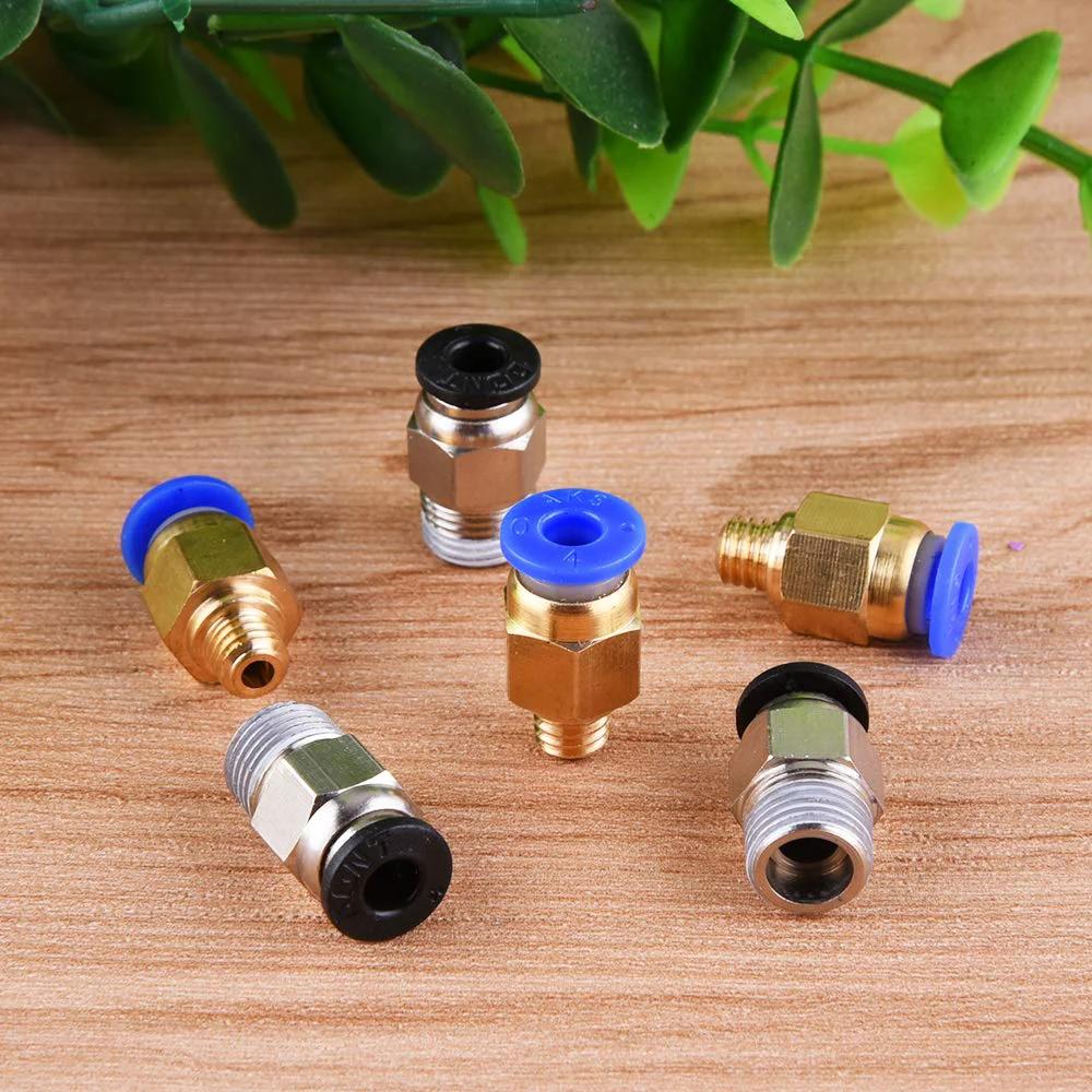 PC4 fittings for PTFE Teflon Tubing Kit for 3D printers 1.75mm filament, showing multiple connectors on a wooden surface.