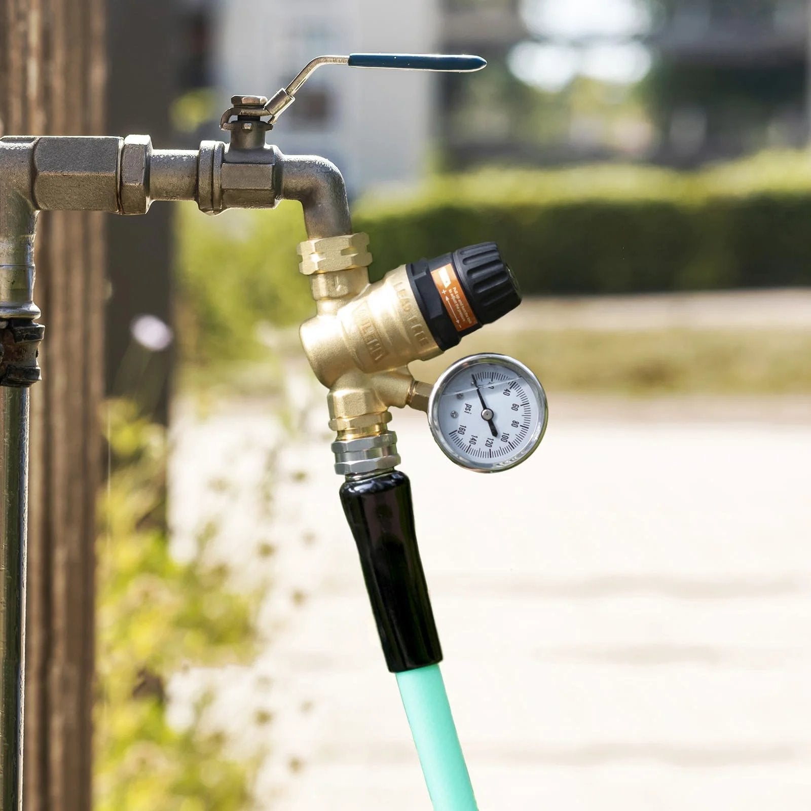 RV Water Pressure Regulator Valve With Adjustable Handle And Dual Filters For Camper And Travel Trailer installed on pipe