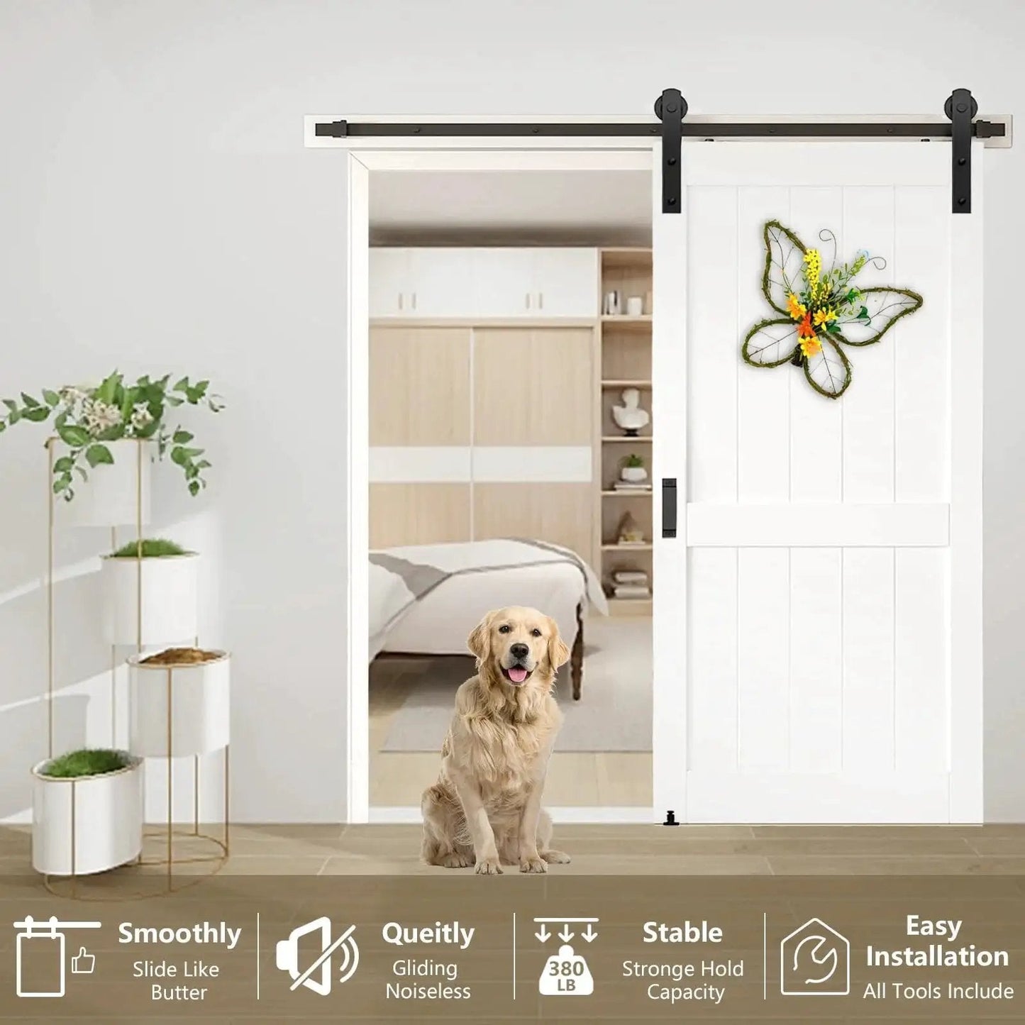 White interior room with sliding barn door hardware kit 6.6 ft heavy duty for smooth quiet operation installed, dog sitting in doorway.