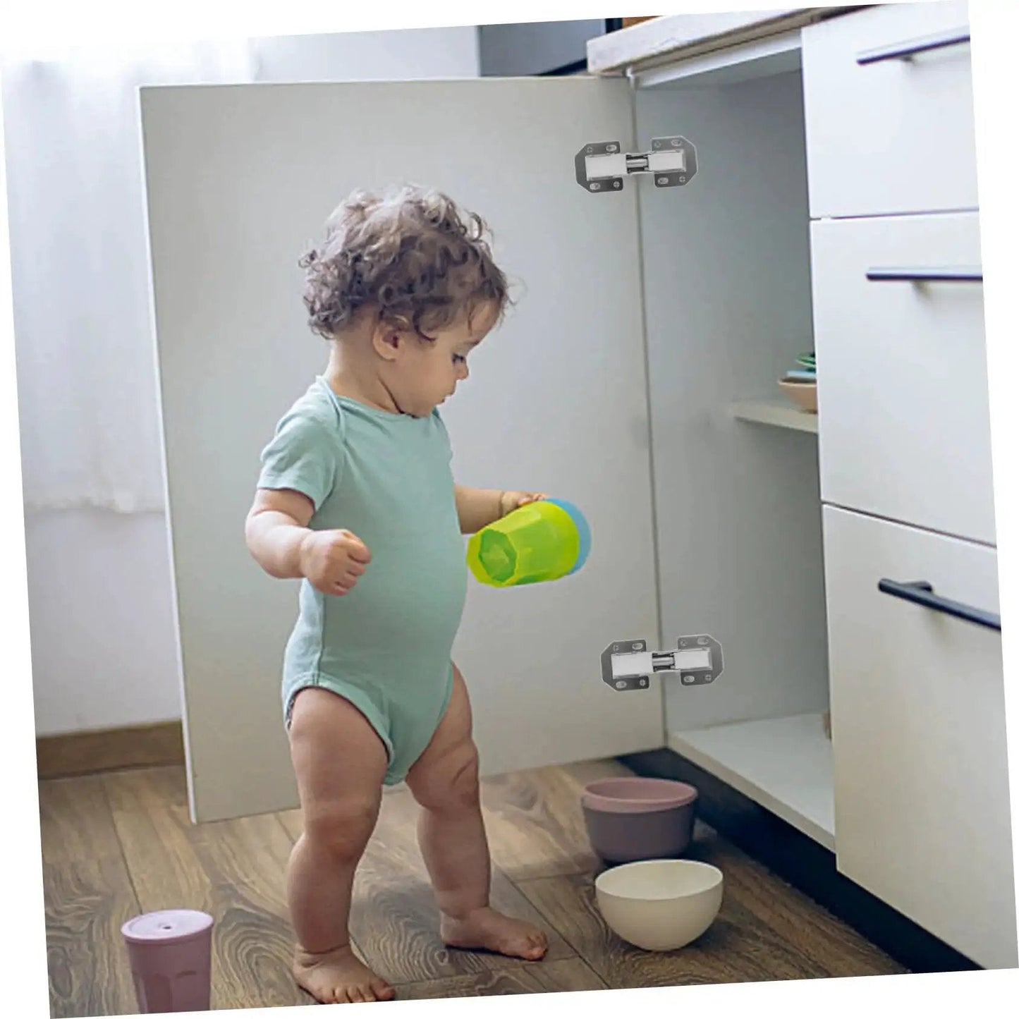 Wardrobe Hinge Repair Kit With High Load Bearing Capacity And Symmetrical Design For Kitchen Cabinet Doors Built To Last Heavy Duty Friction Hinges Durable Metal Parts Easy Installation With Included Tools Reinforced Hinge System installed on cabinet door with child playing nearby.