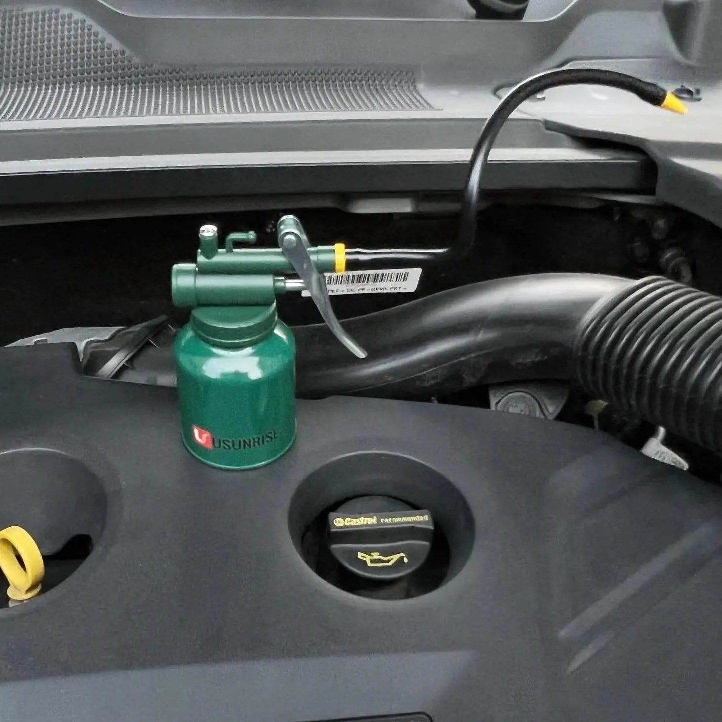 Green metal Garage Ready Dual Spout Oiler Can 8oz with flexible spout for precision lubrication on auto engine