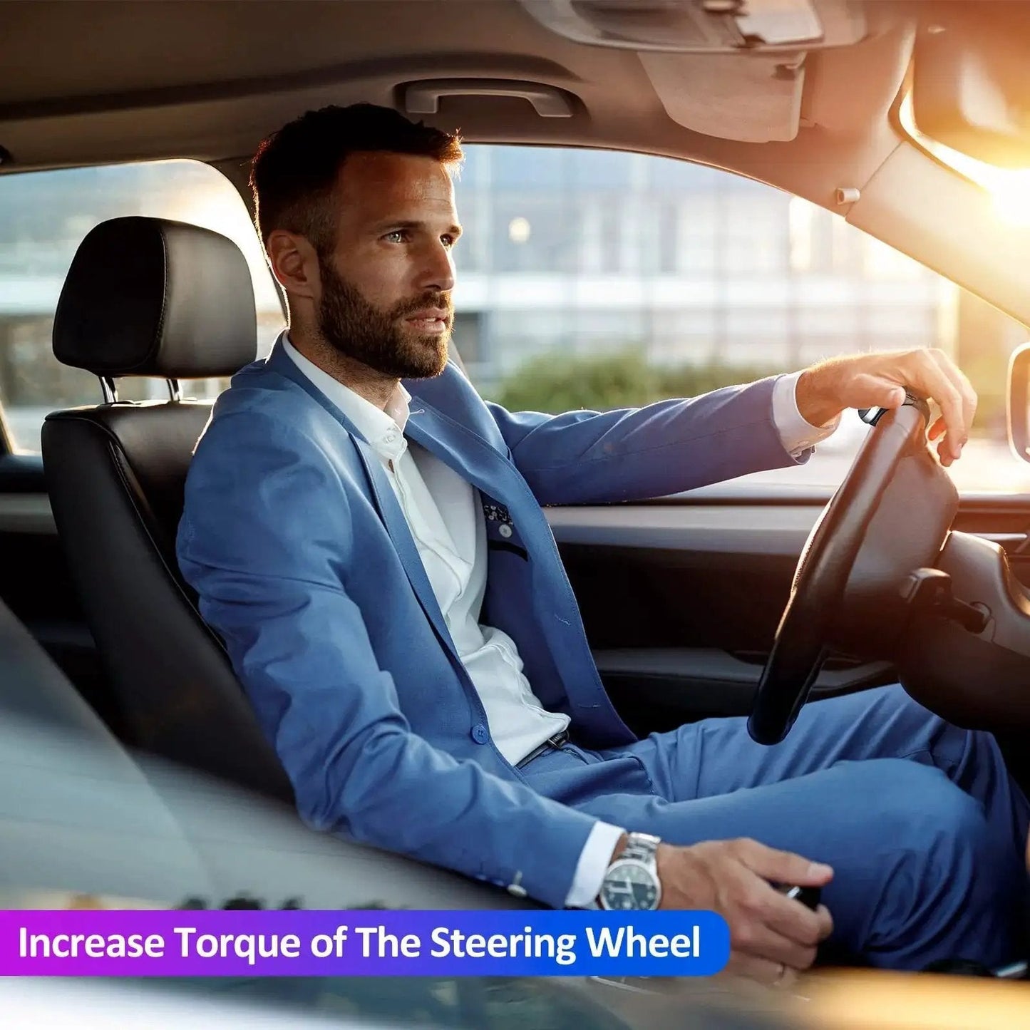 Man driving with Spinner Knob Steering Wheel Buddy With 360 Degree Rotation For Easy Driving in a car