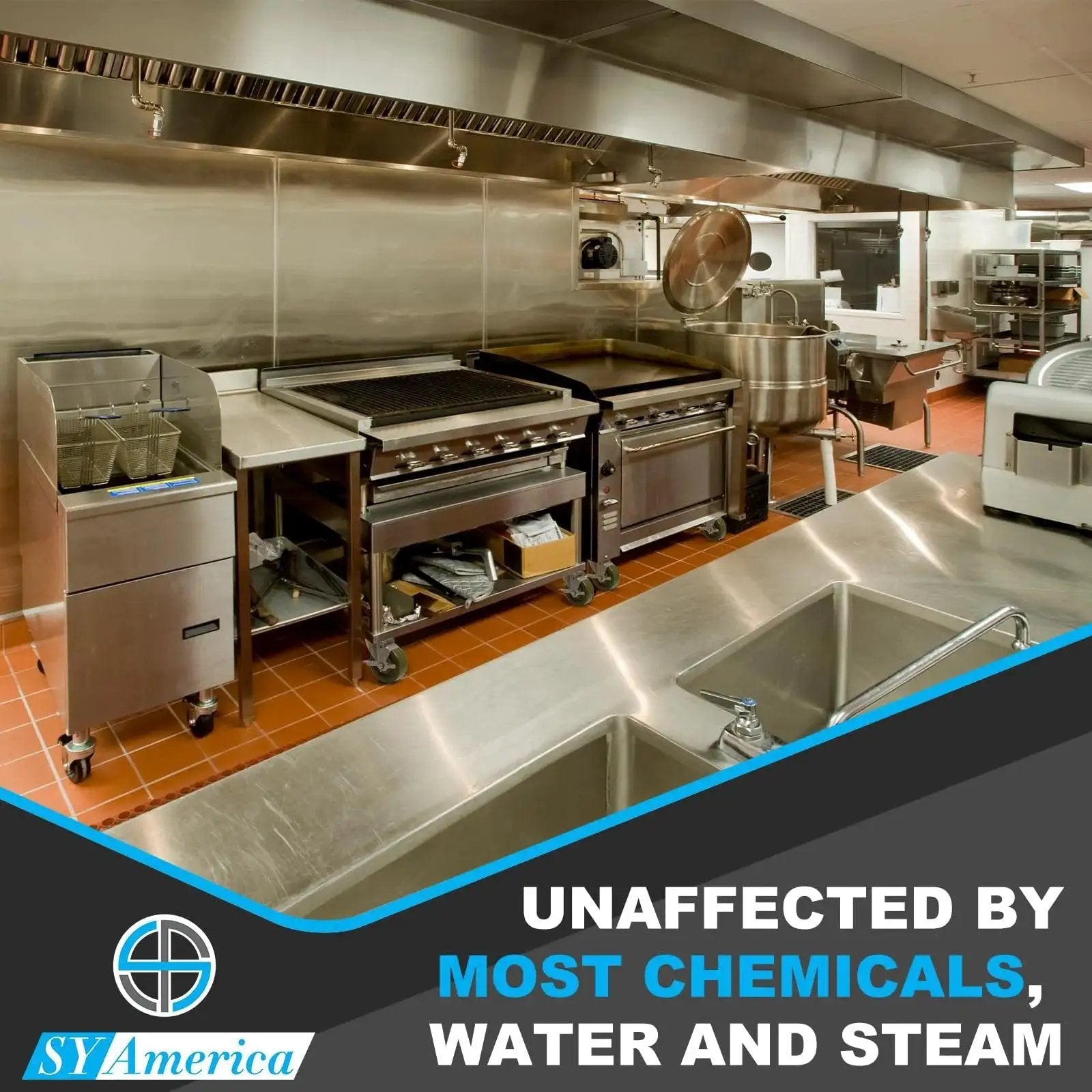 Commercial kitchen with stainless steel equipment, emphasizing durability against chemicals and steam.