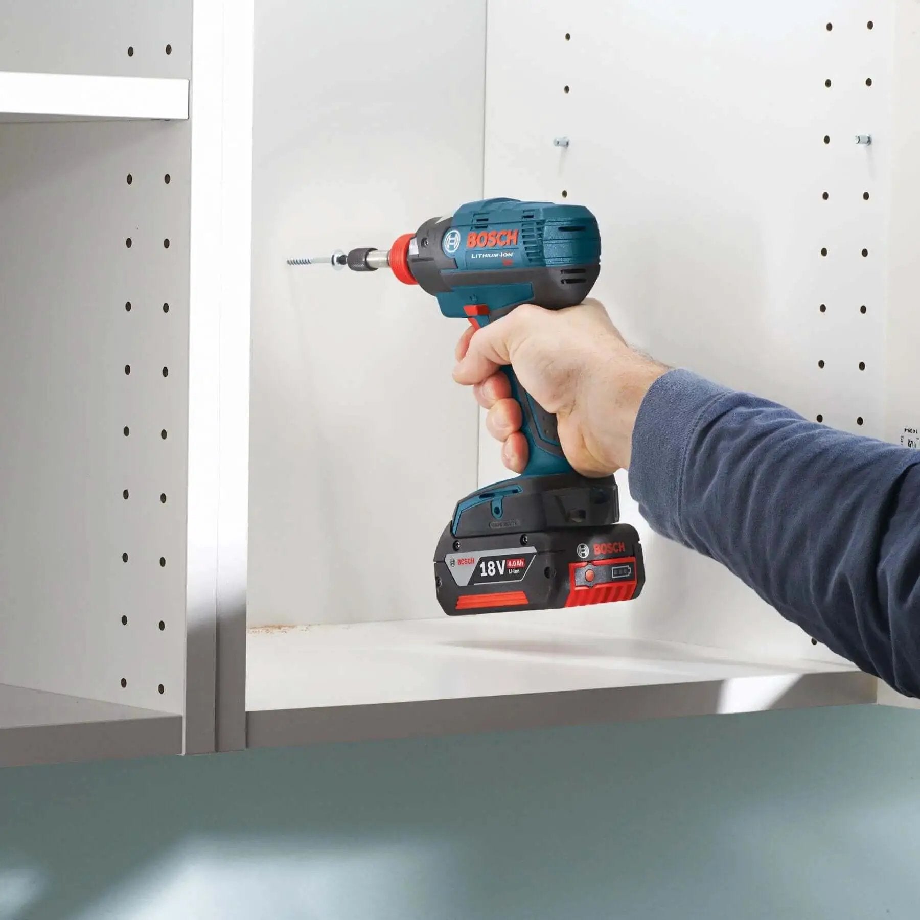 Person using Bosch drill with Impact Tough Insert Bits Set For Heavy Duty Drilling Boss Grade Bosch 10 Pack 1 Inch Phillips And Square Number Two