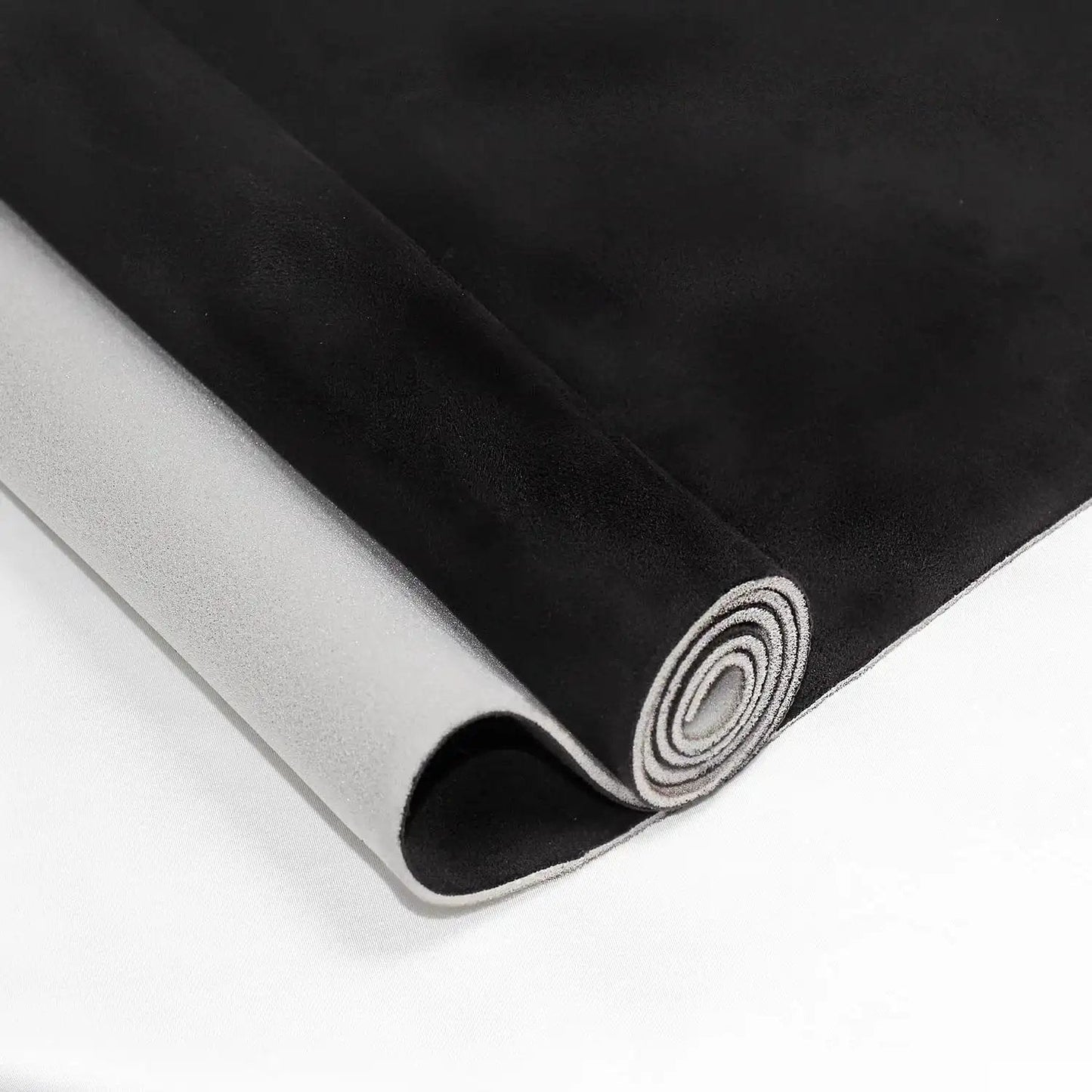 Black Suede Headliner Fabric With Foam Backing rolled view.