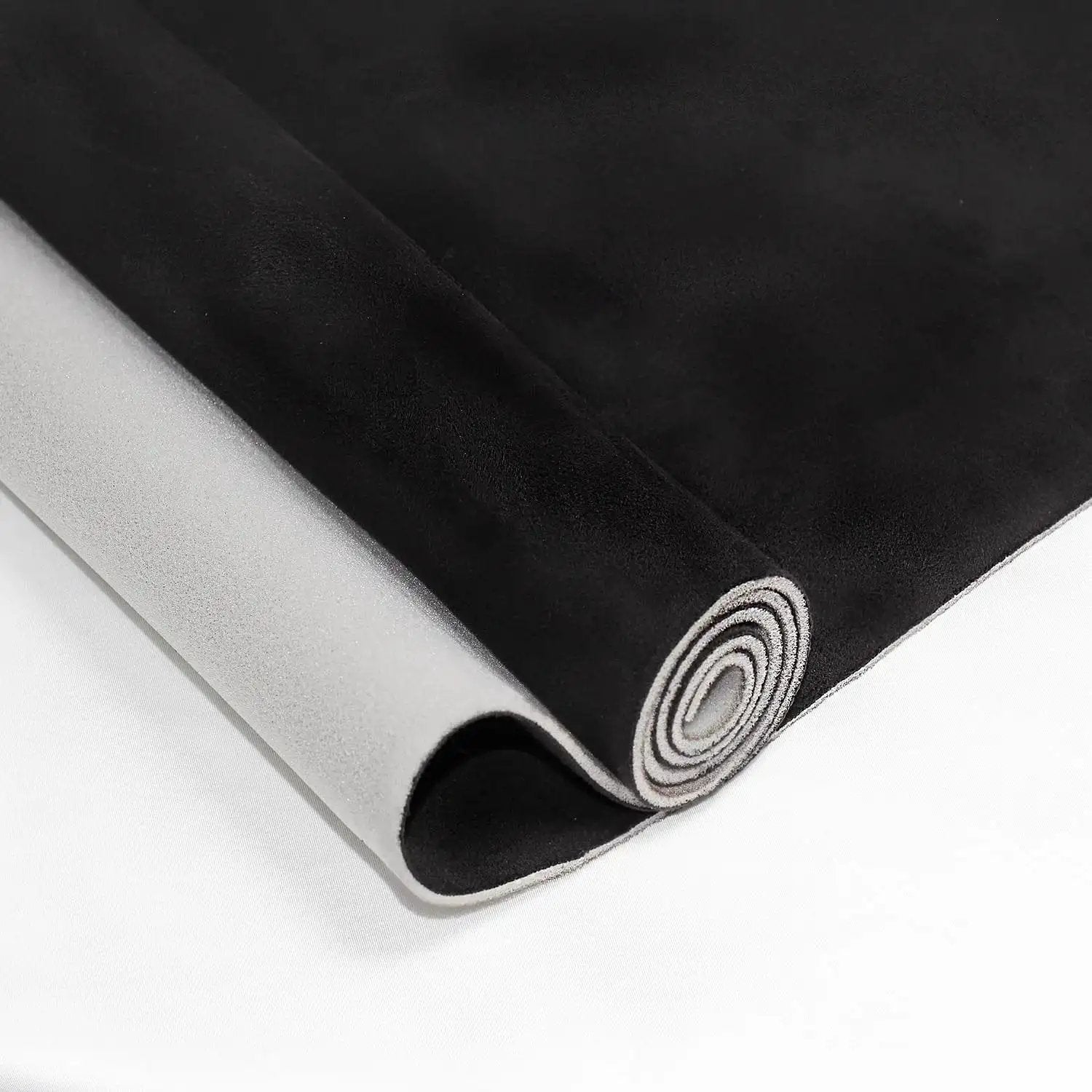 Black Suede Headliner Fabric With Foam Backing rolled view.