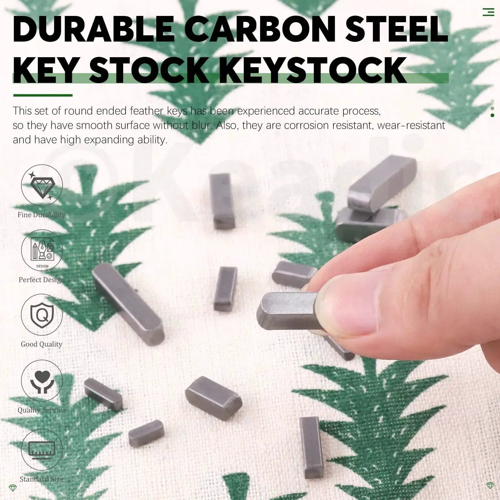 Hand holding a carbon steel round ended feather key from a set of 140 for drive shaft and pulley fastening and connection.